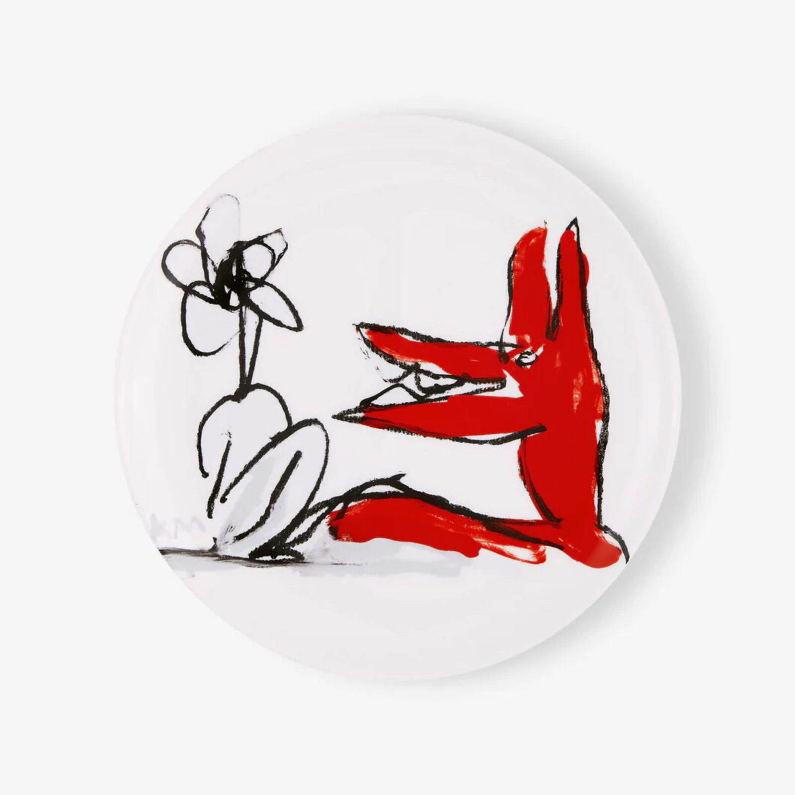 A white plate with a red and black drawing of a woman holding a flower.