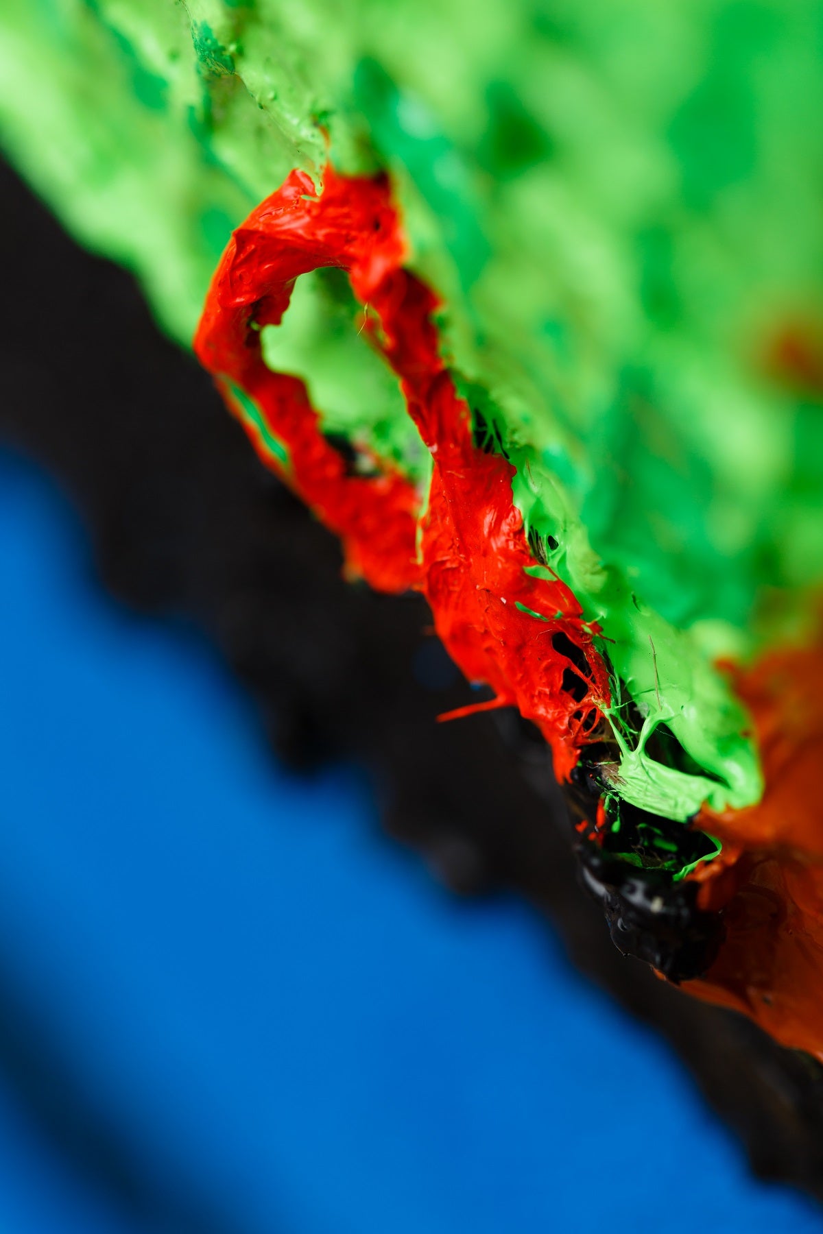 A piece of art that is on a white surface.