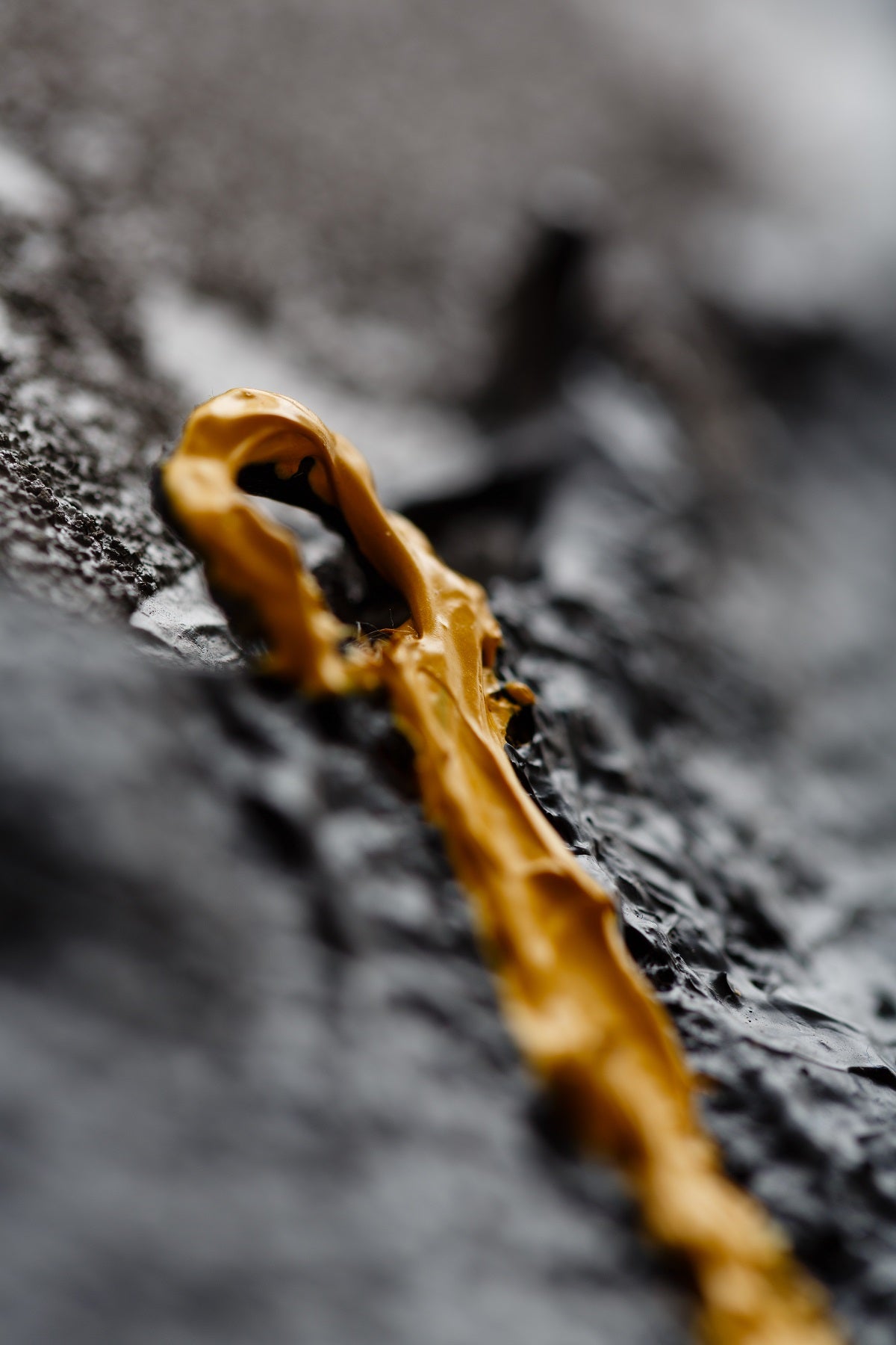 A piece of art that is on a white surface.