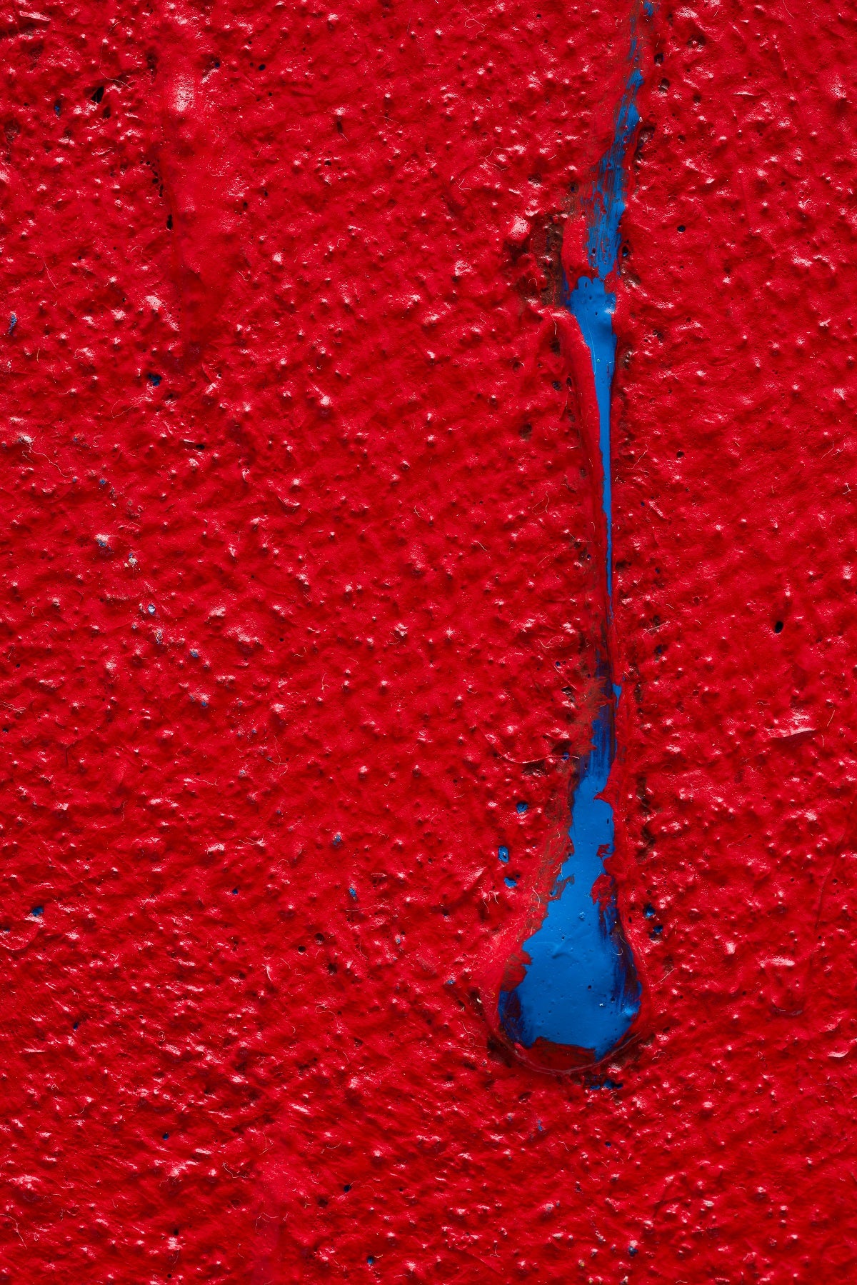 A painting of a red, yellow, blue, and orange abstract painting.