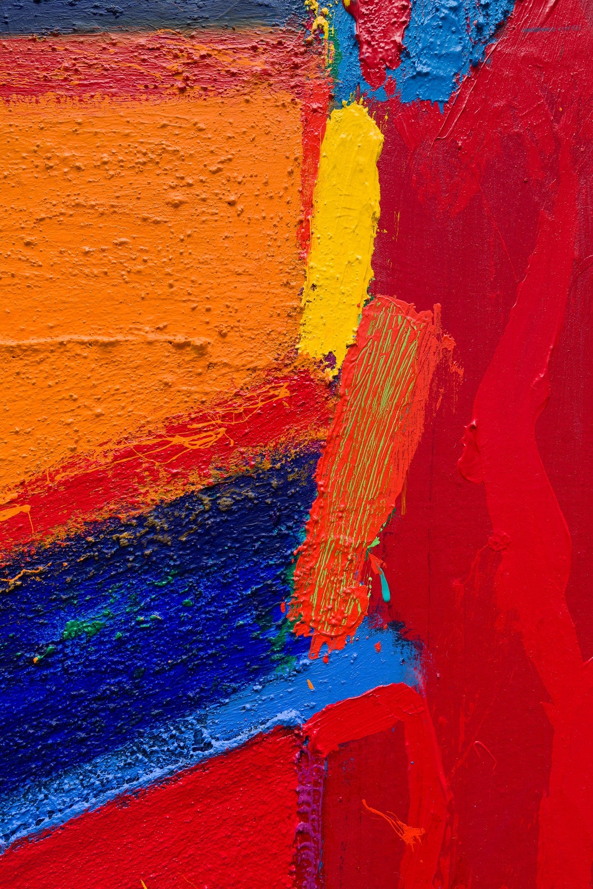 A painting of a red, yellow, blue, and orange abstract painting.