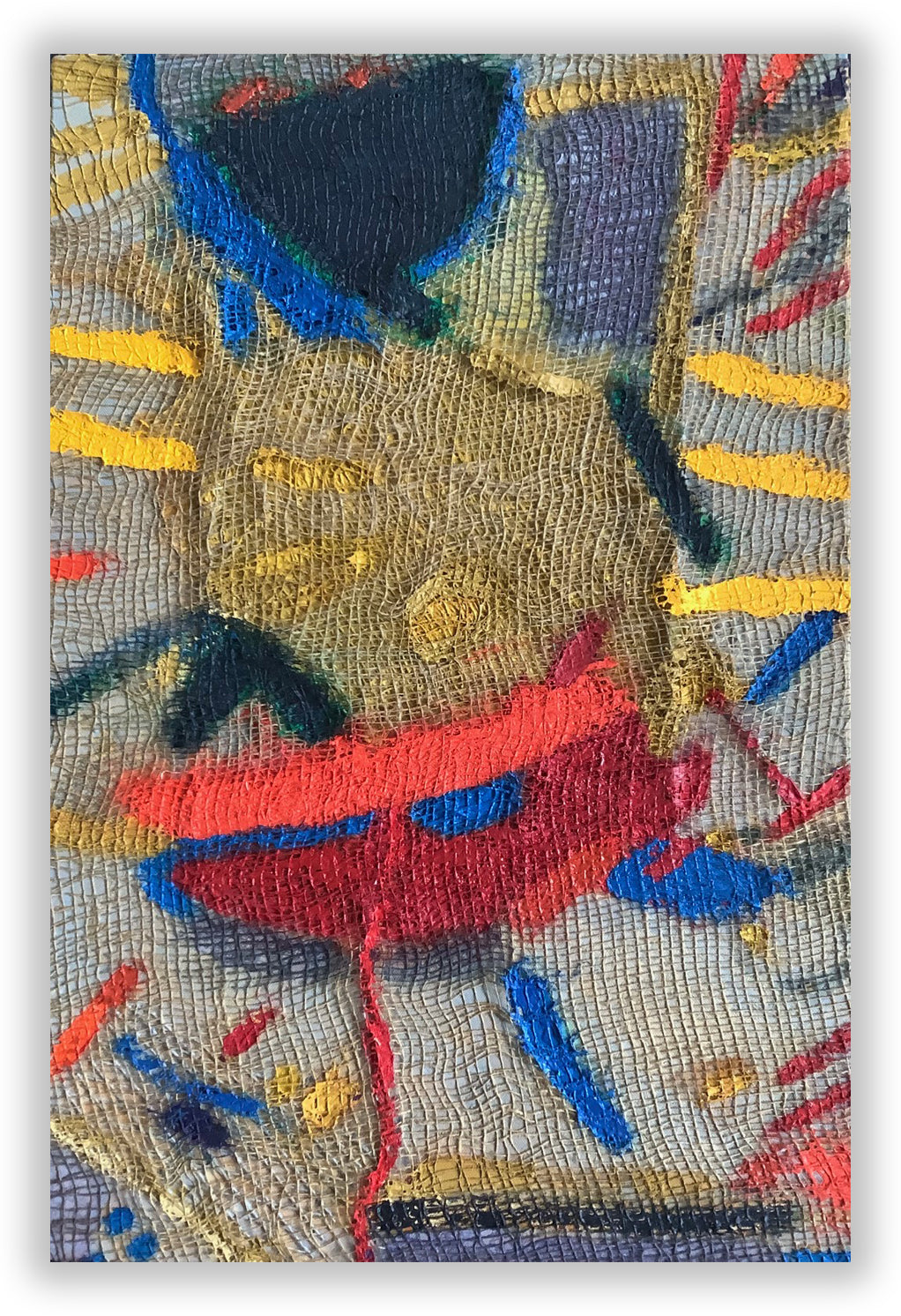 A close up of a piece of art on a white background.