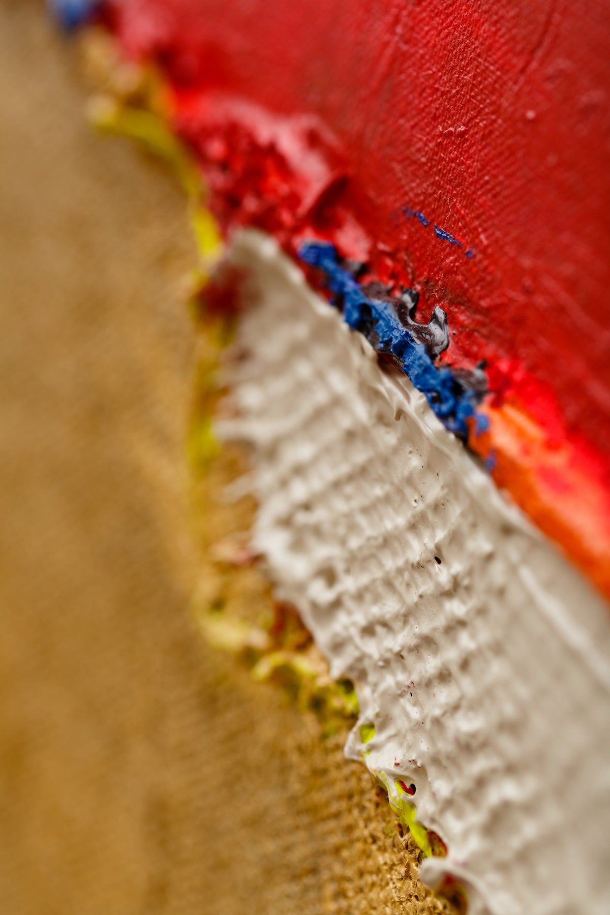 A piece of art that is on a white surface.