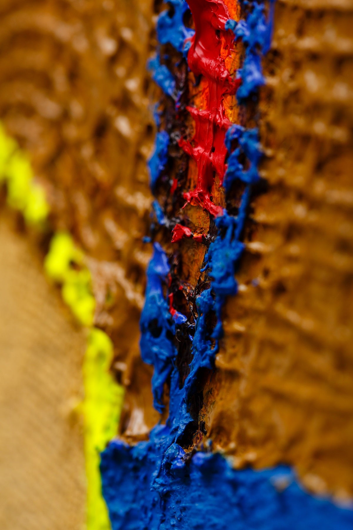 A piece of art that is on a white surface.