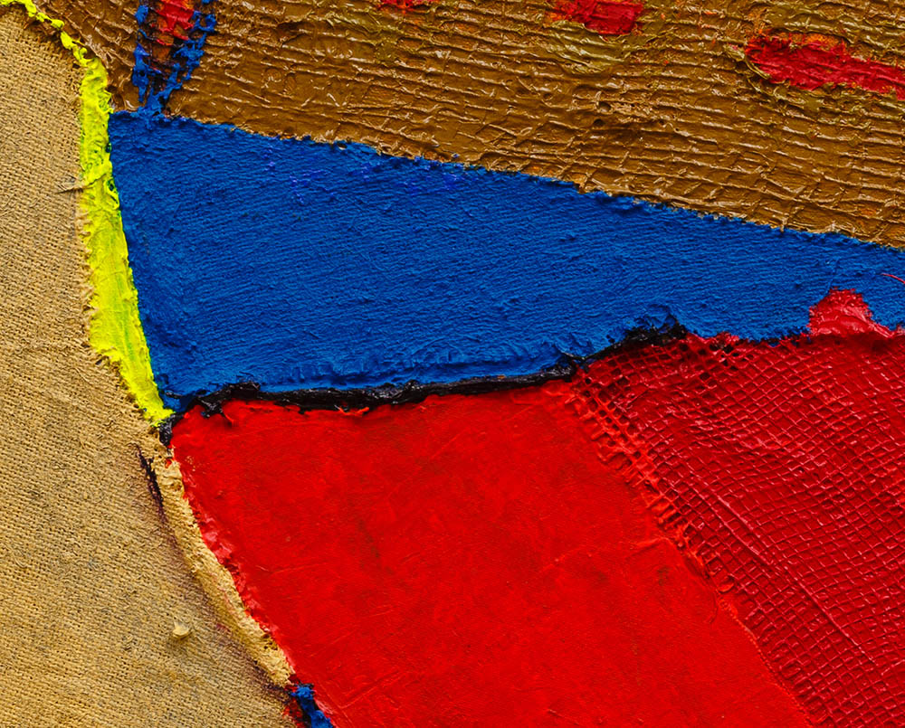 A piece of art that is on a white surface.