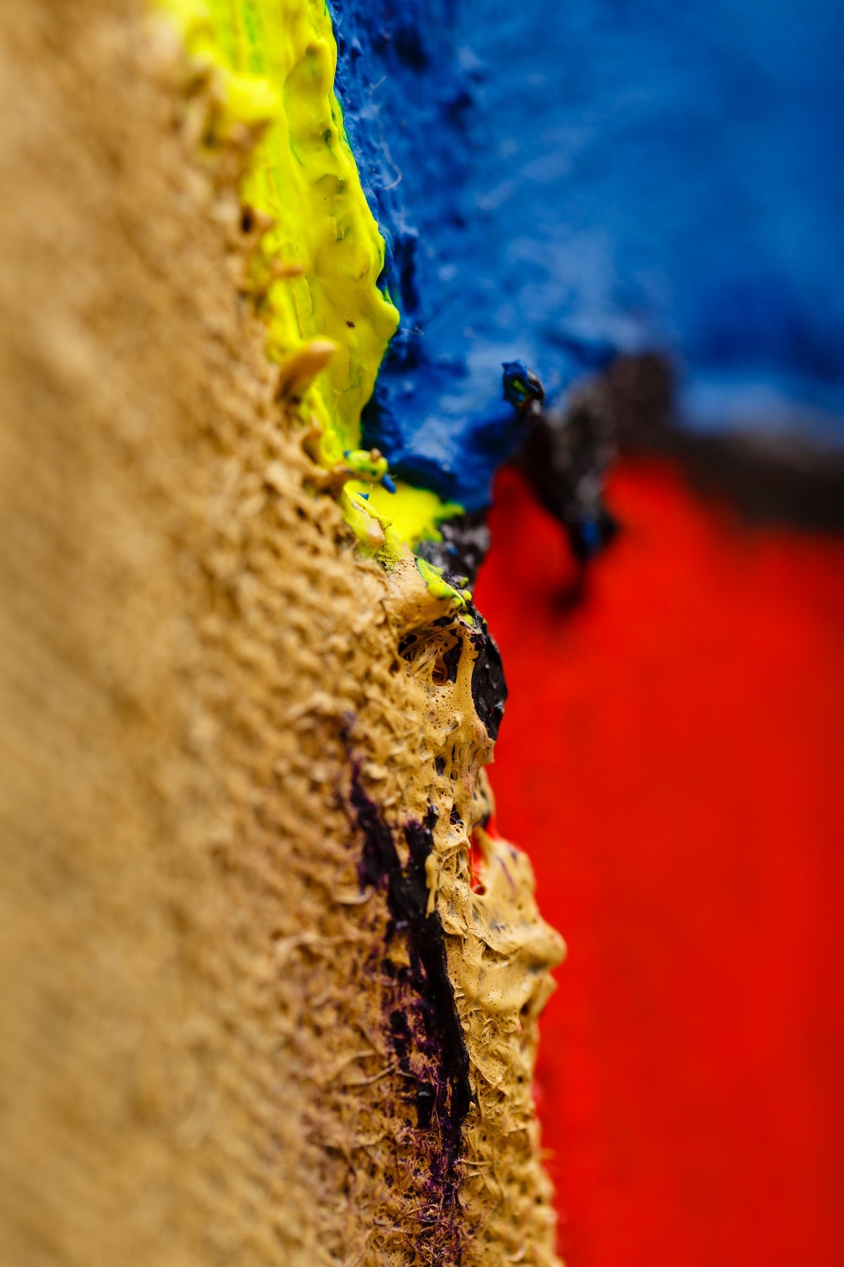 A piece of art that is on a white surface.