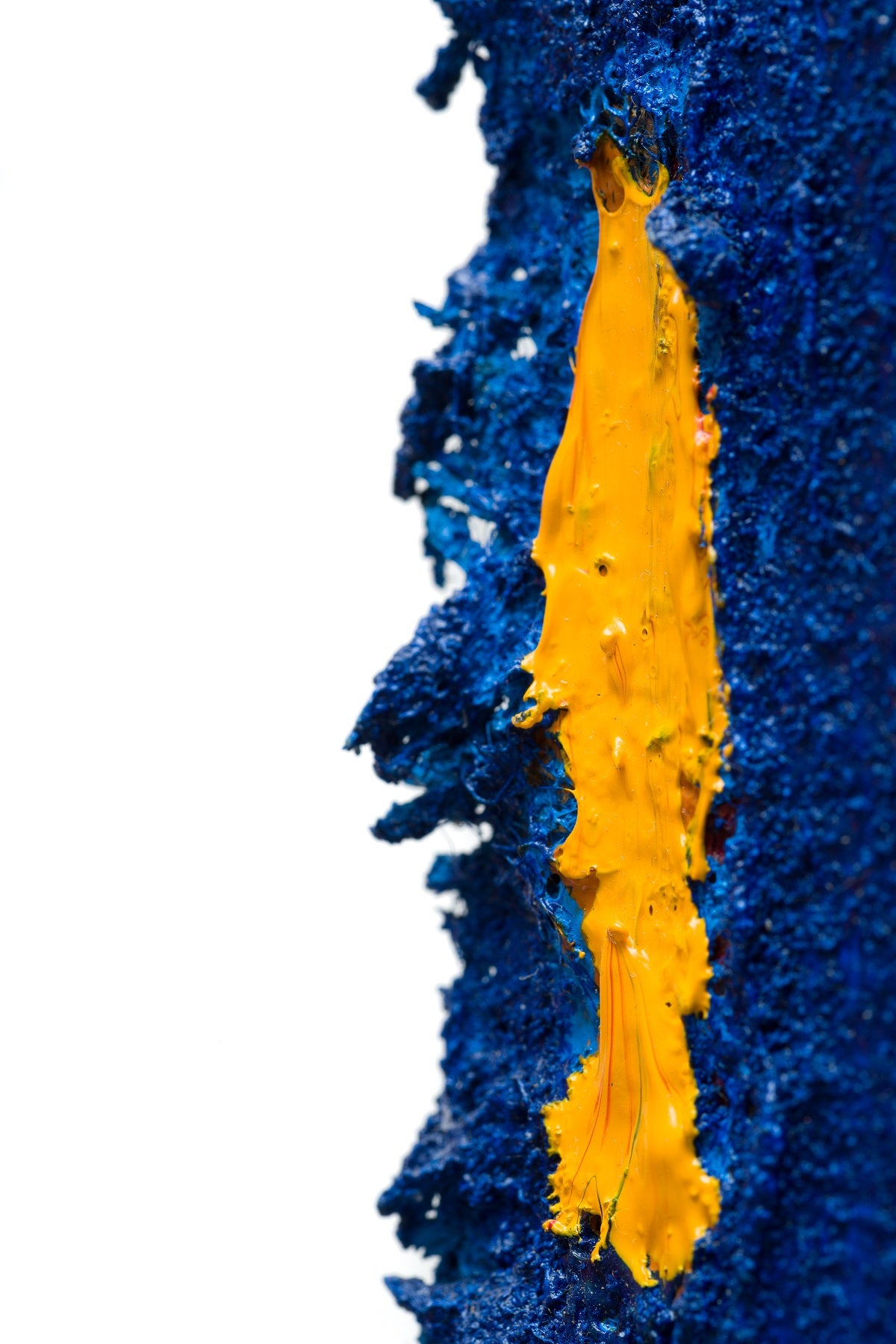 A piece of art that is on a white surface.