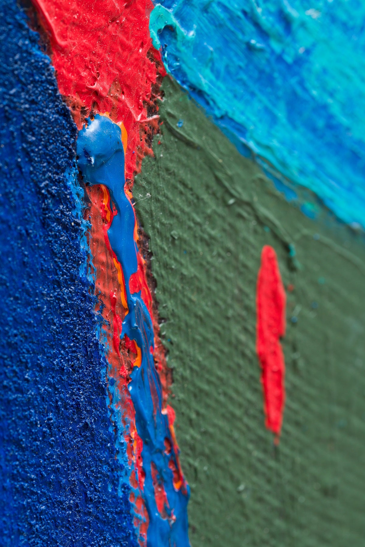 A piece of art that is on a white surface.