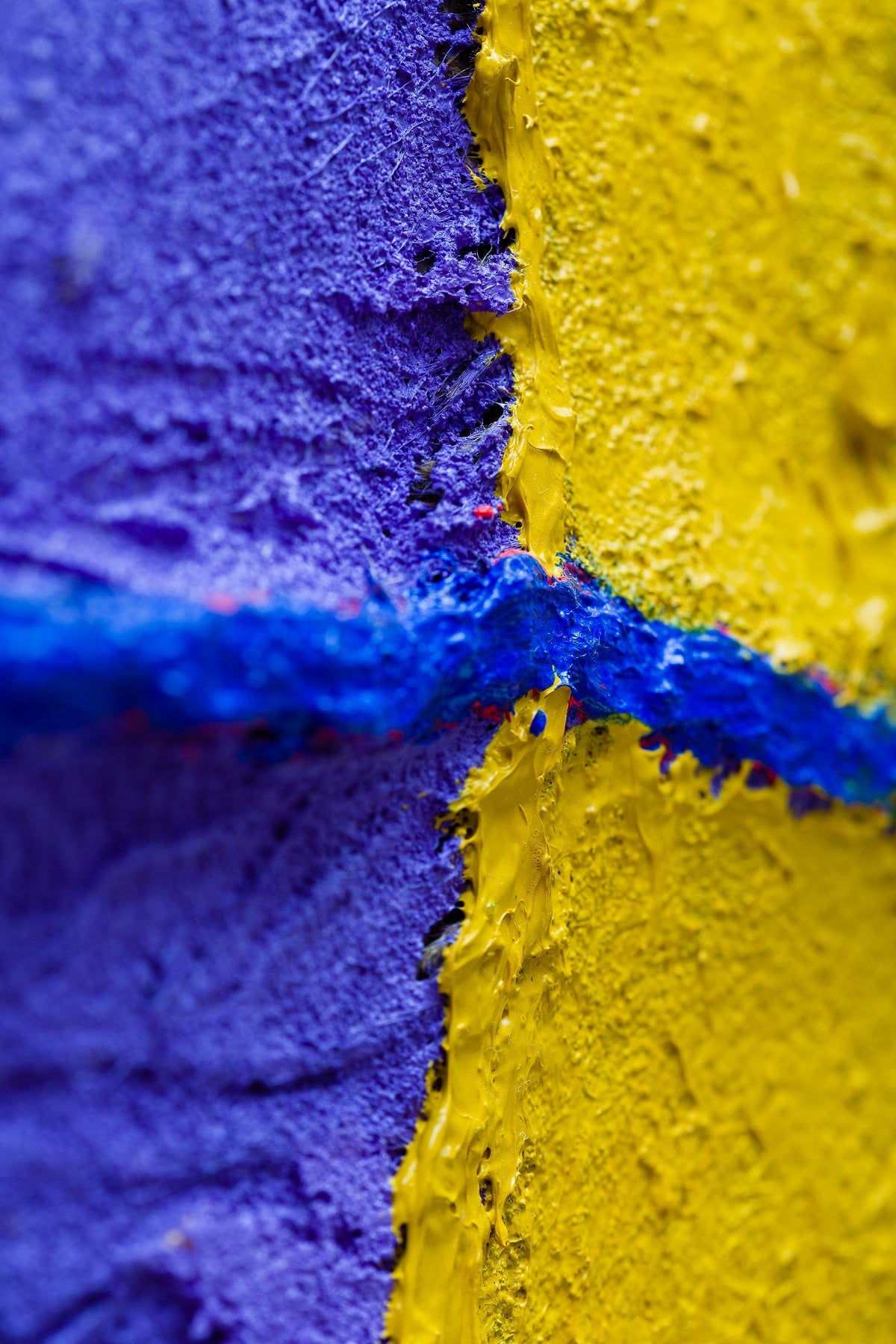 A piece of art that is on a white surface.