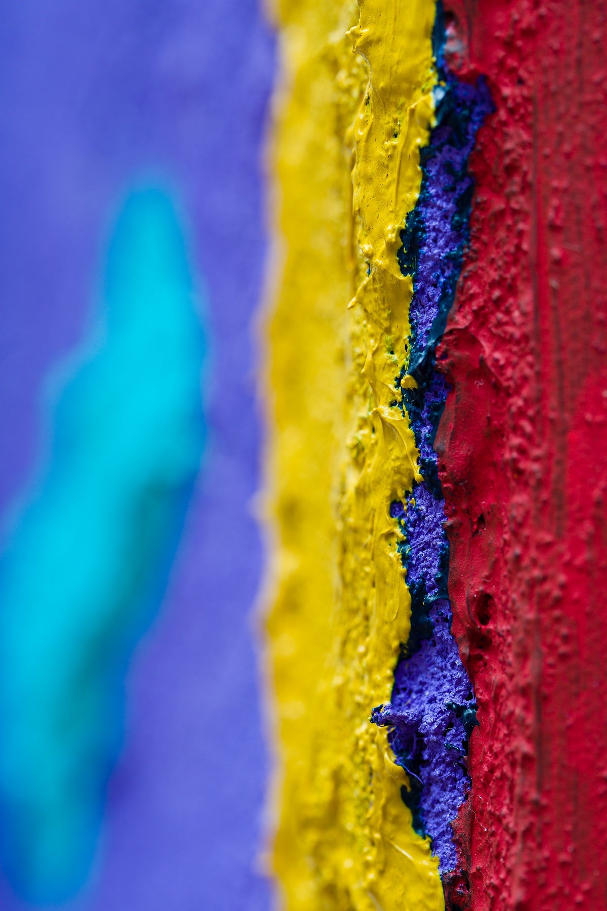 A piece of art that is on a white surface.