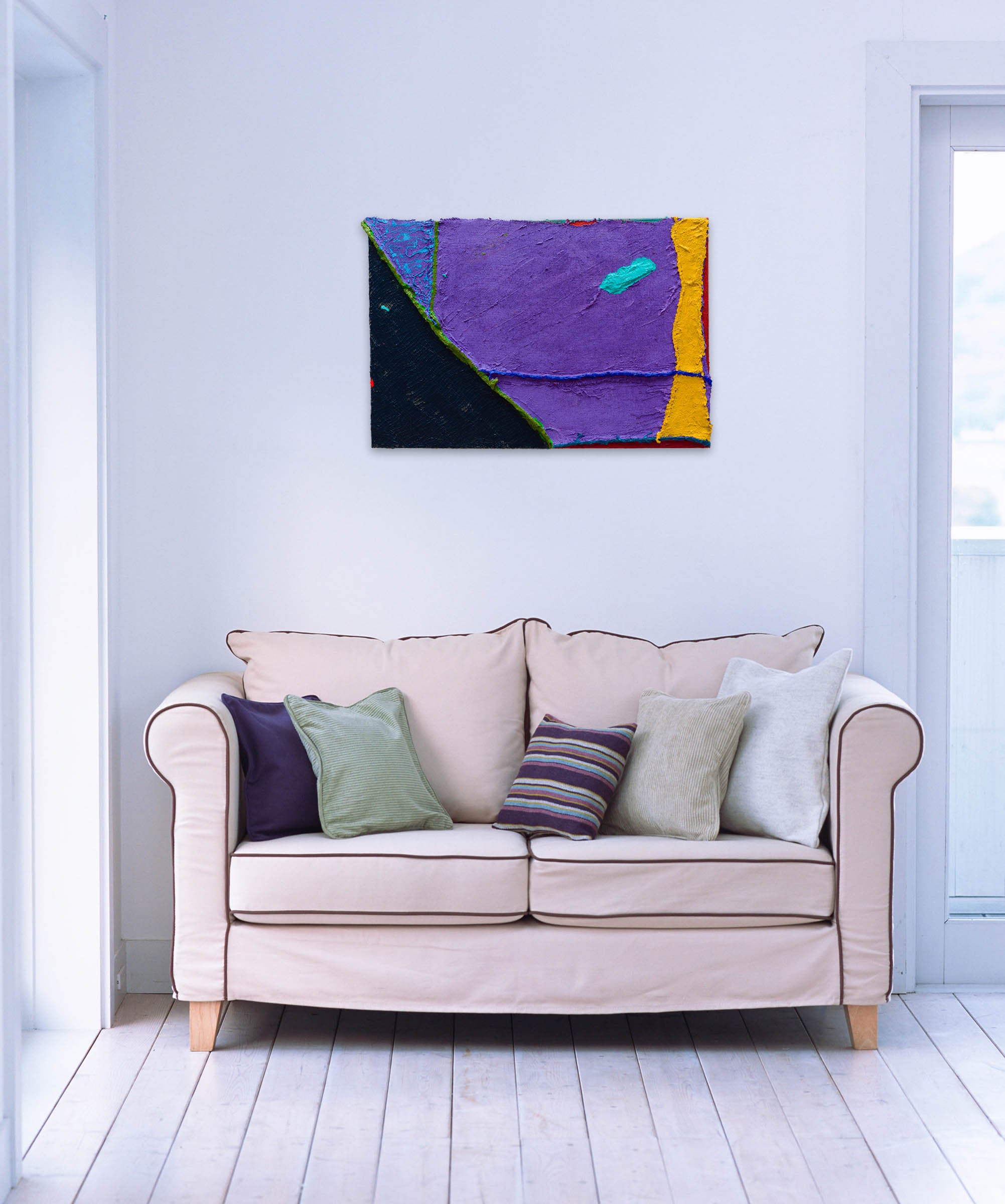 A piece of art that is on a white surface.