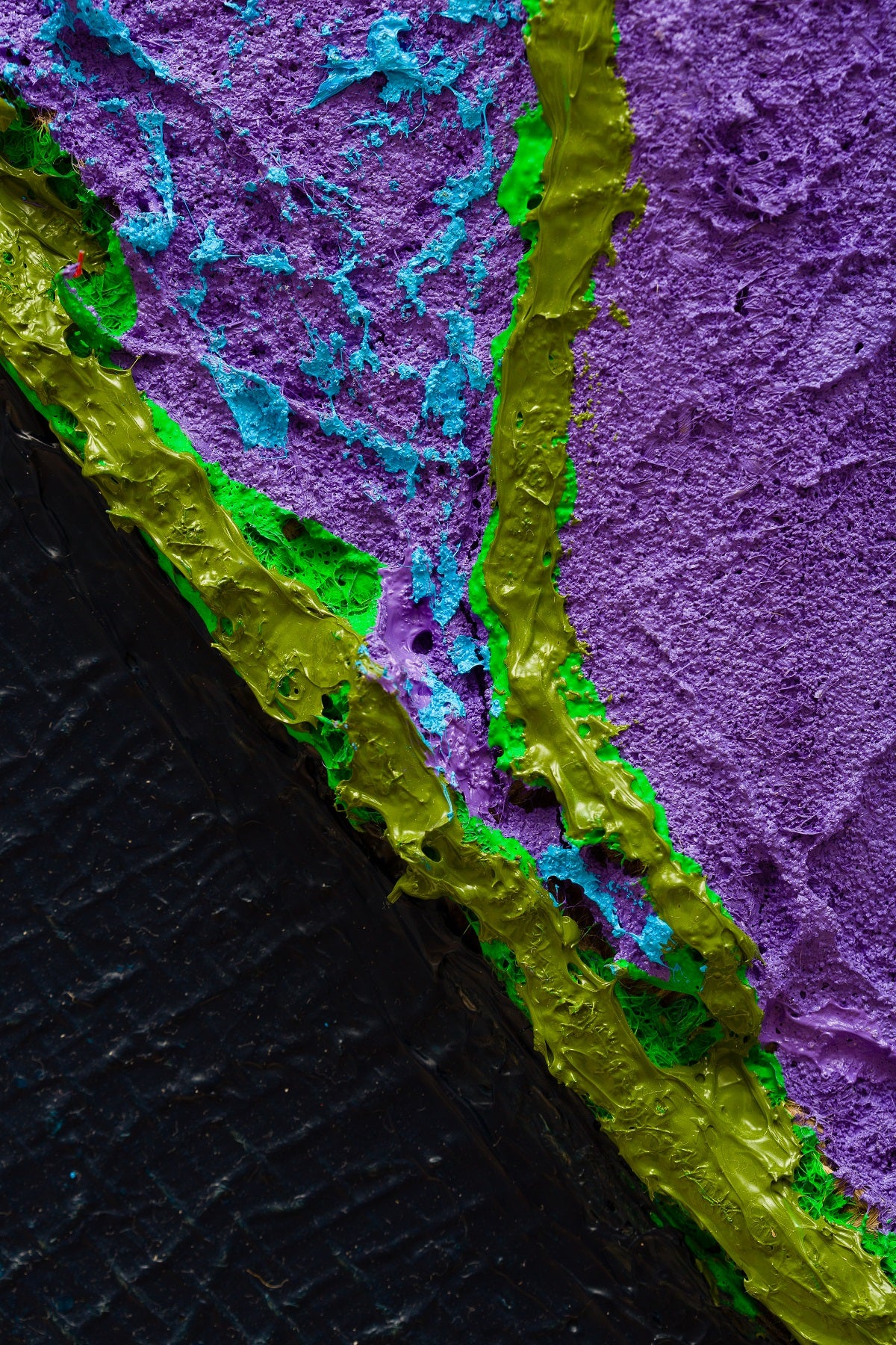 A piece of art that is on a white surface.