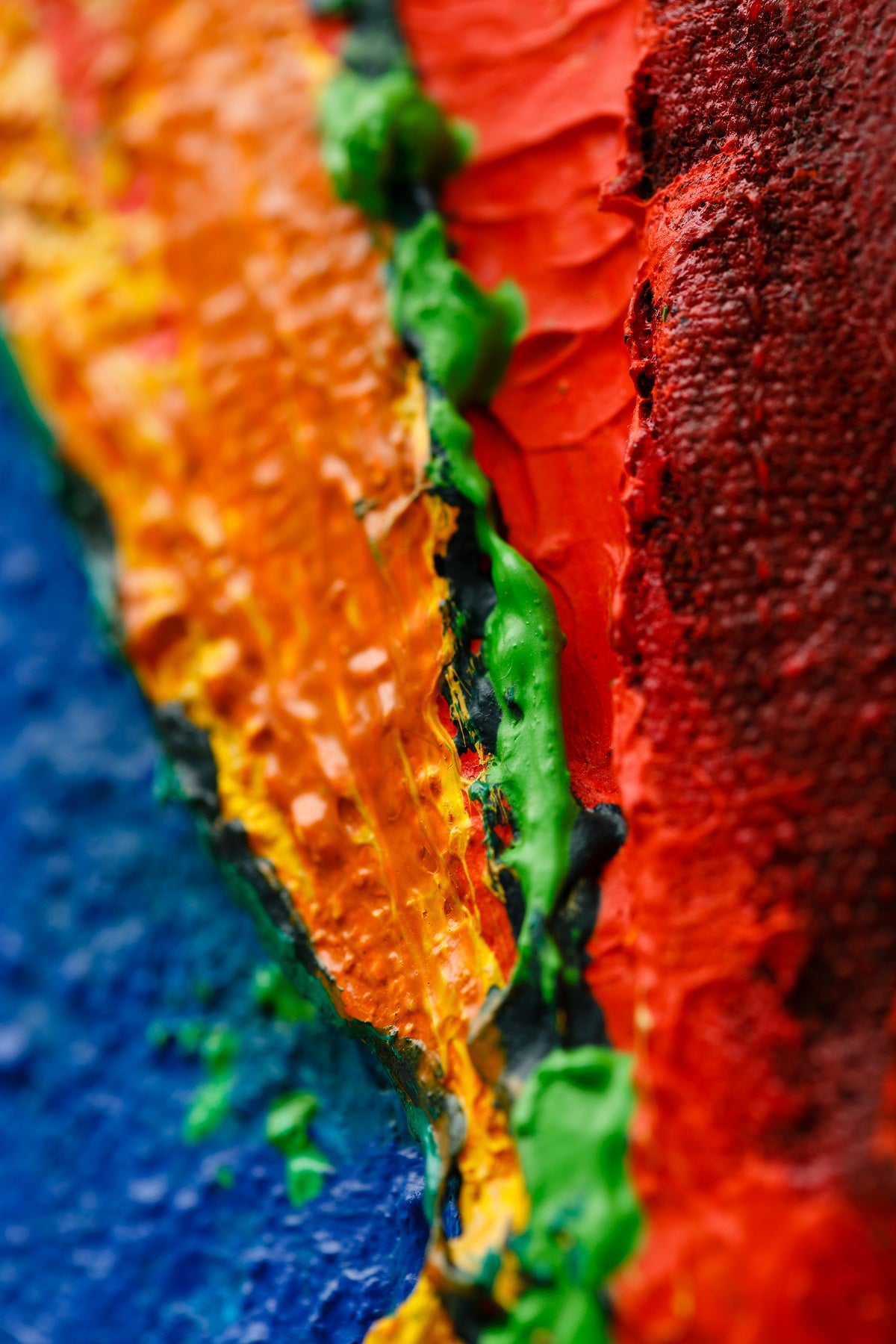 A painting of a red, blue, green, and yellow abstract painting.