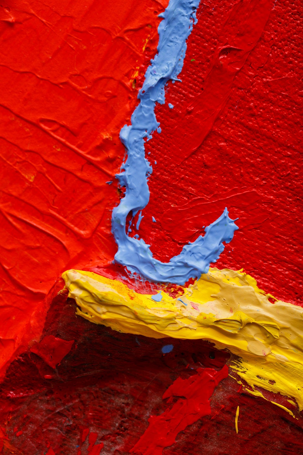 A painting of a red, blue, green, and yellow abstract painting.