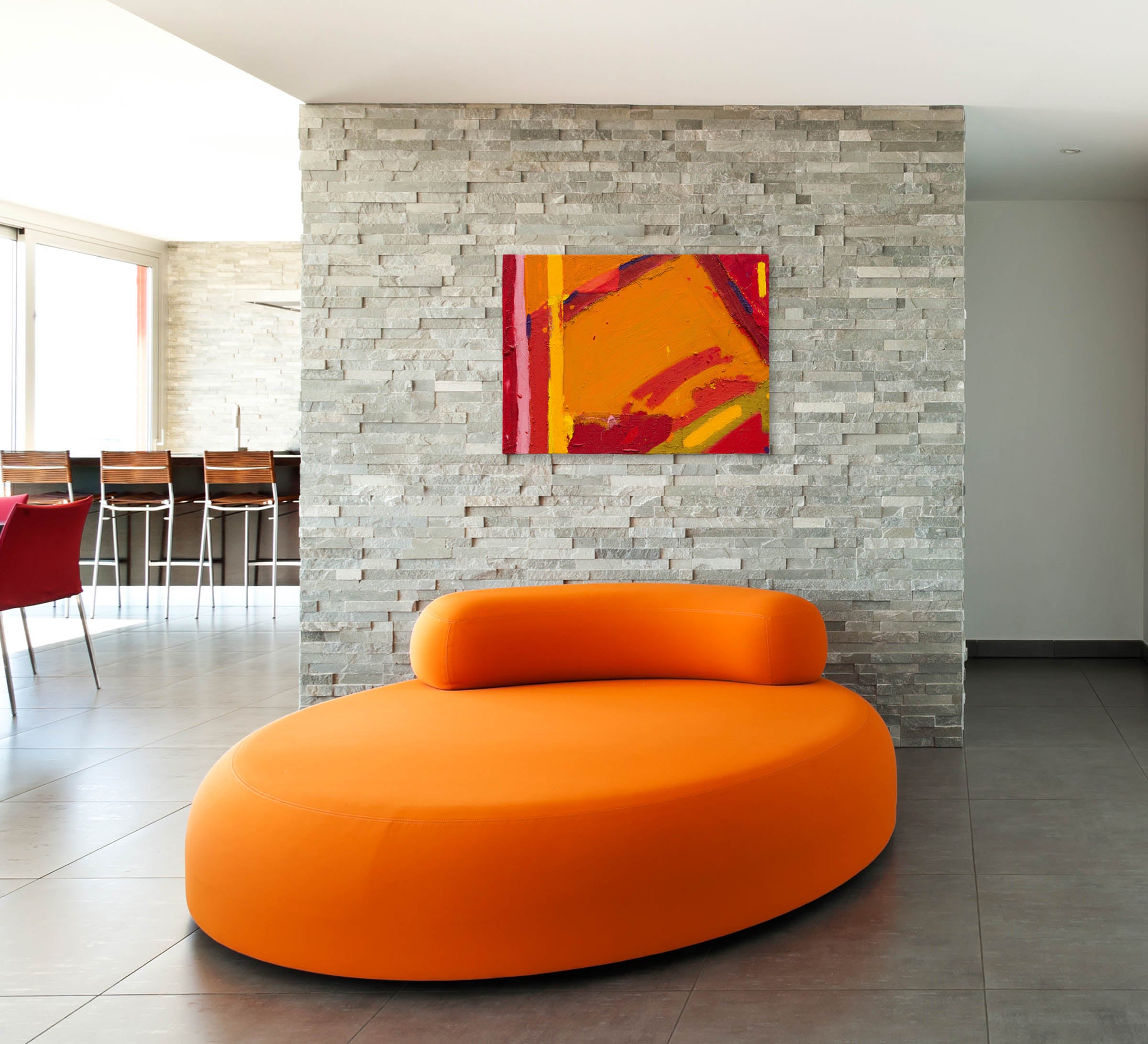 A painting of a red, yellow and orange abstract painting.