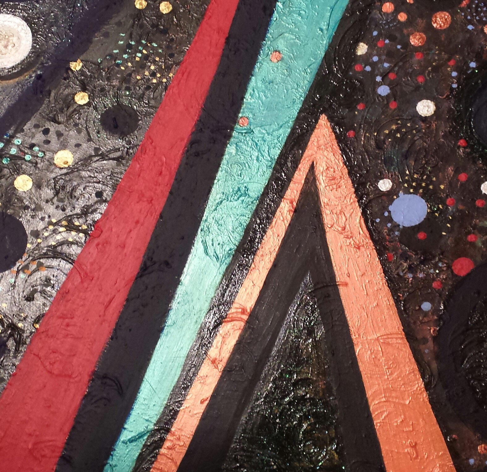 A painting of a black background with a red, blue, and orange design.