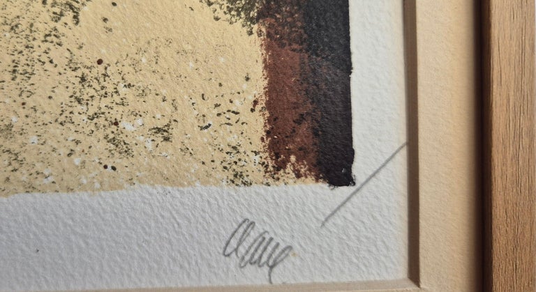 A black and white painting hanging on a wall in a room.