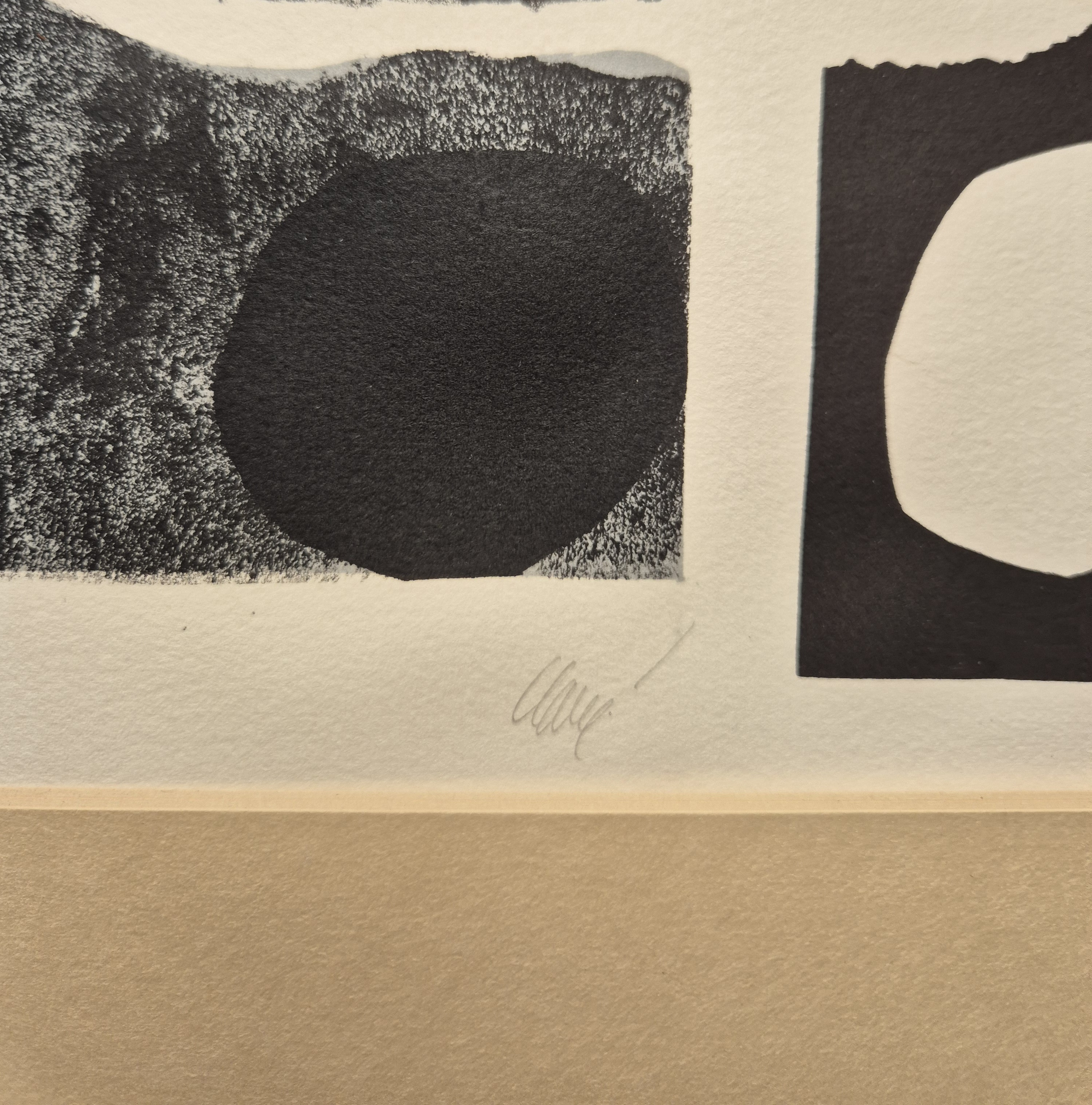 A black and white drawing of a rock in a frame.