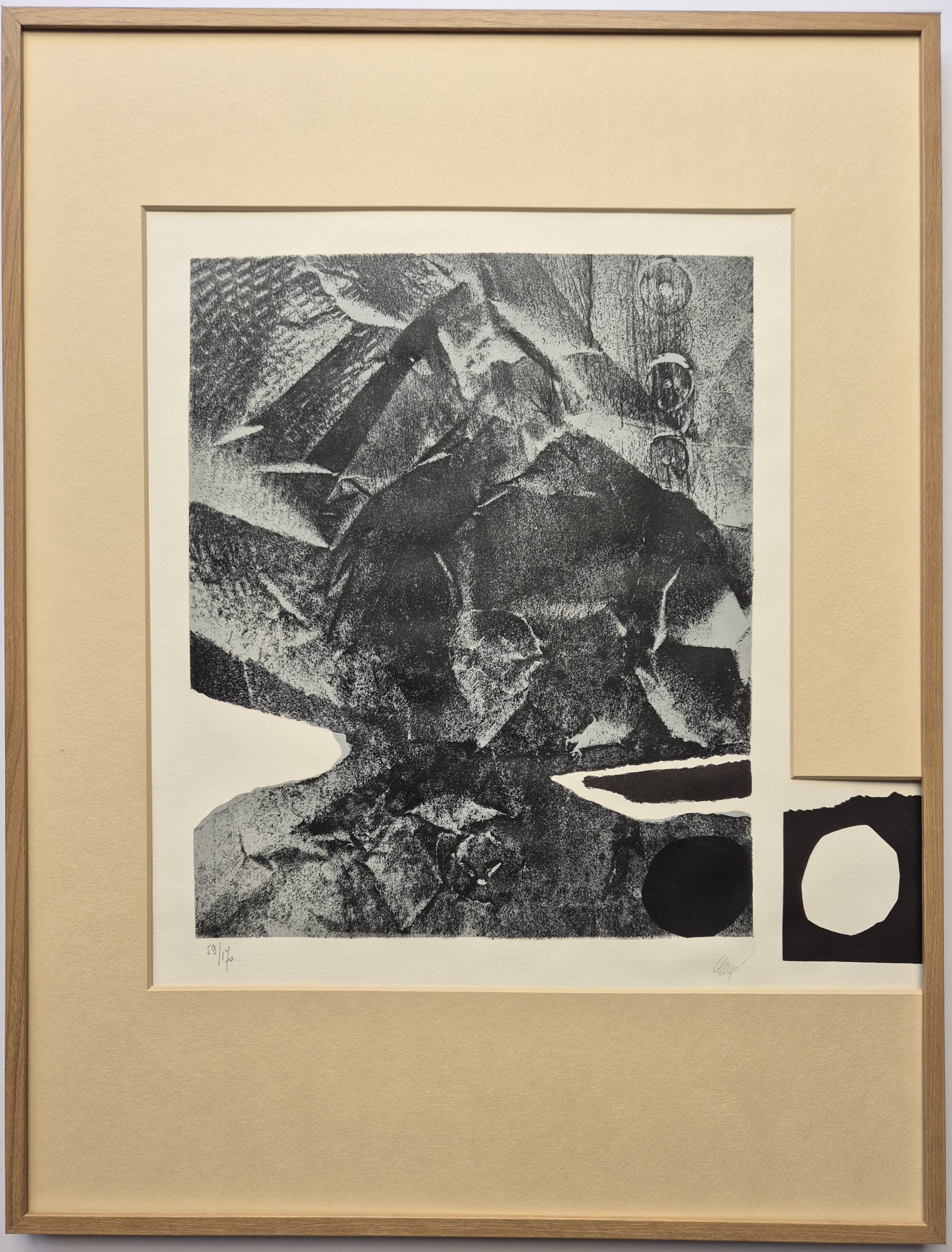 A black and white drawing of a rock in a frame.