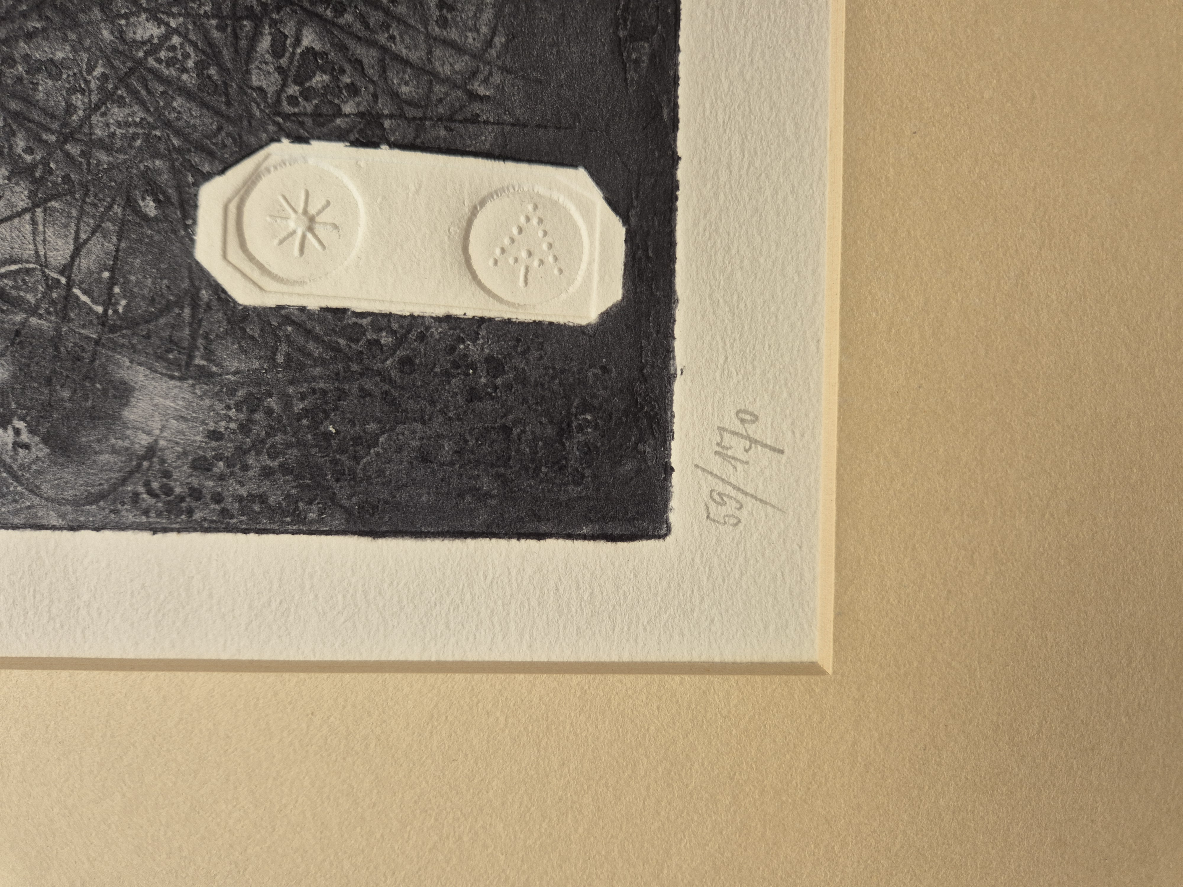 A black and white drawing of a piece of art hanging on a wall.