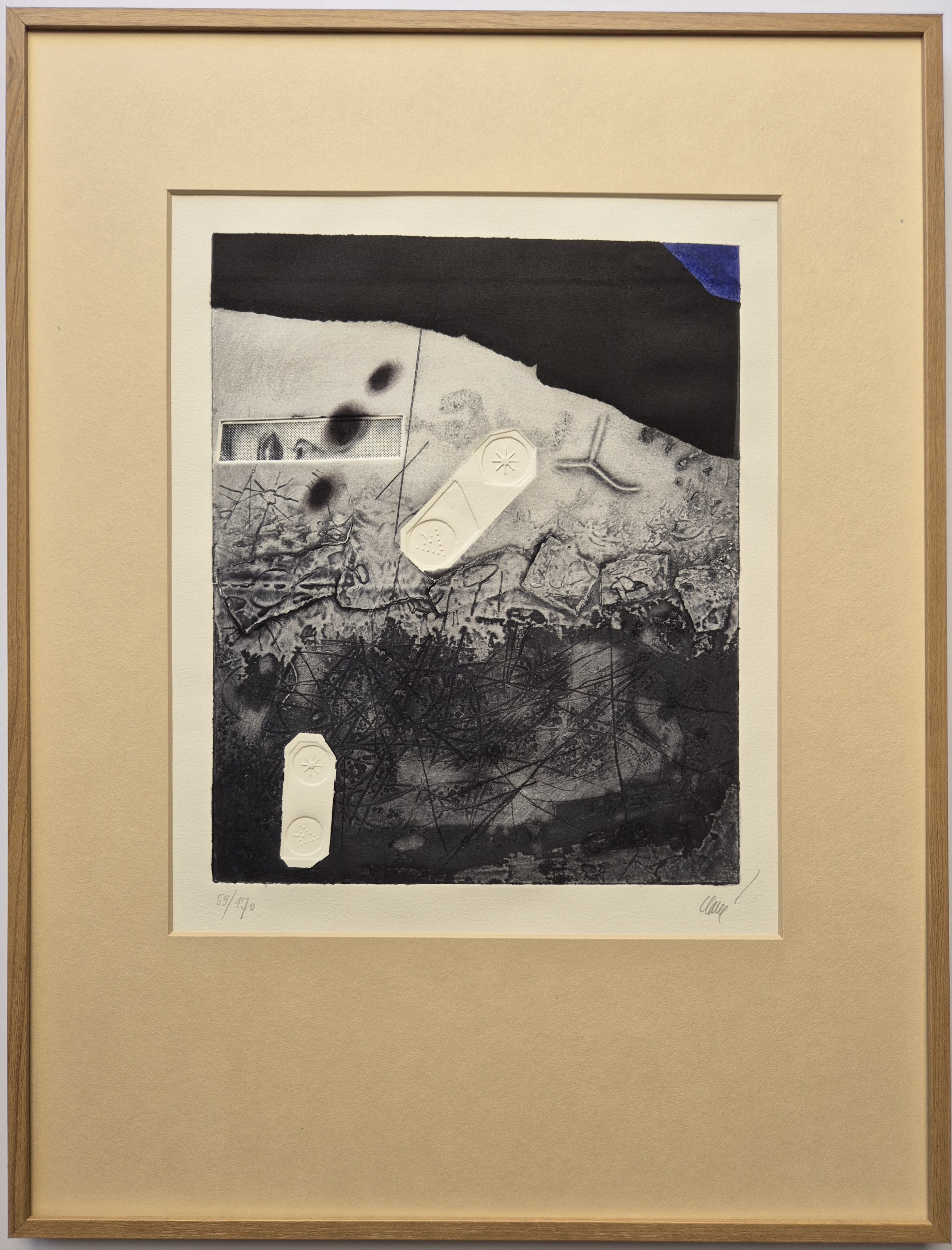 A black and white drawing of a piece of art hanging on a wall.