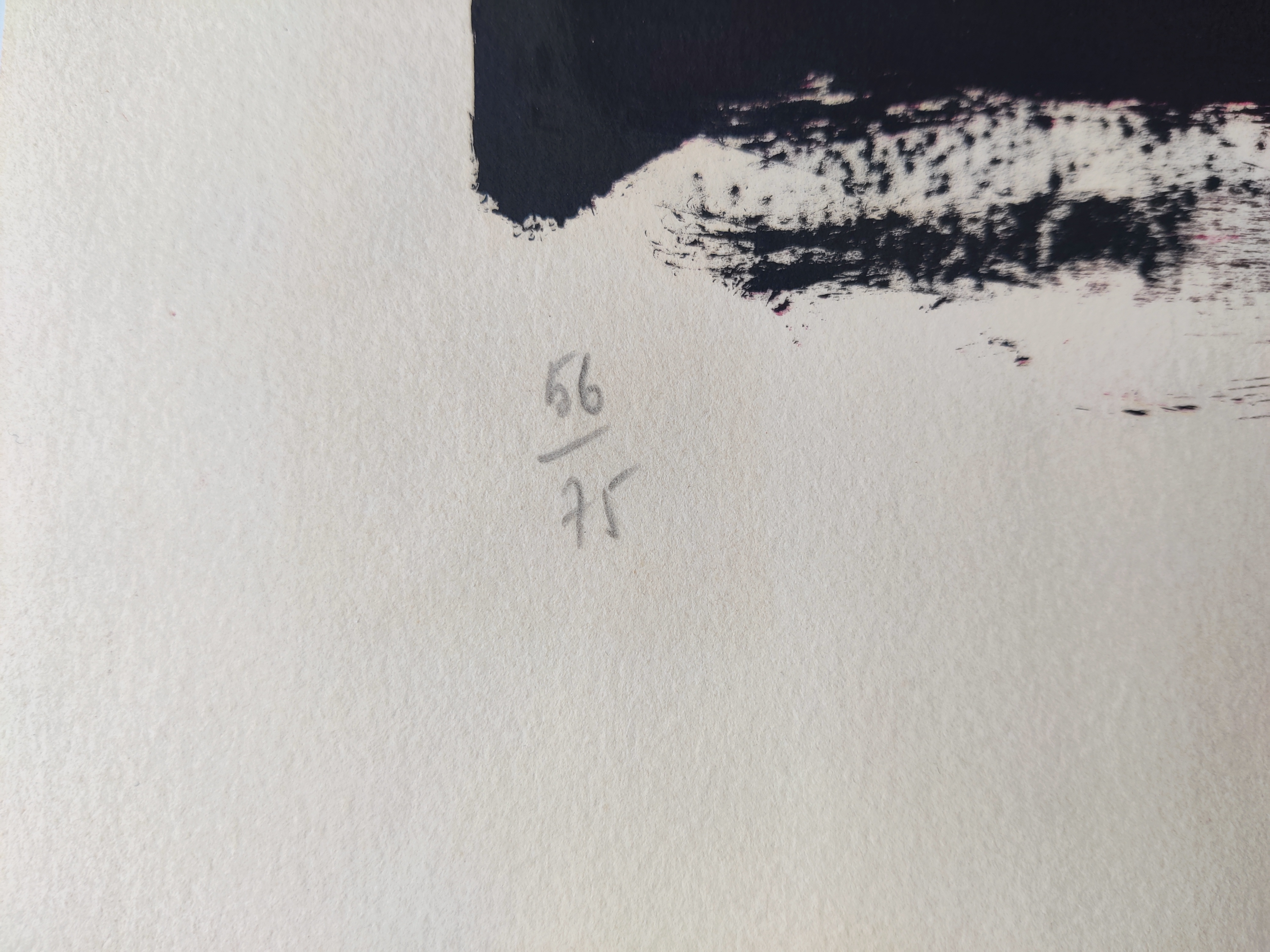 A painting on a blue wall with a red arrow on it.