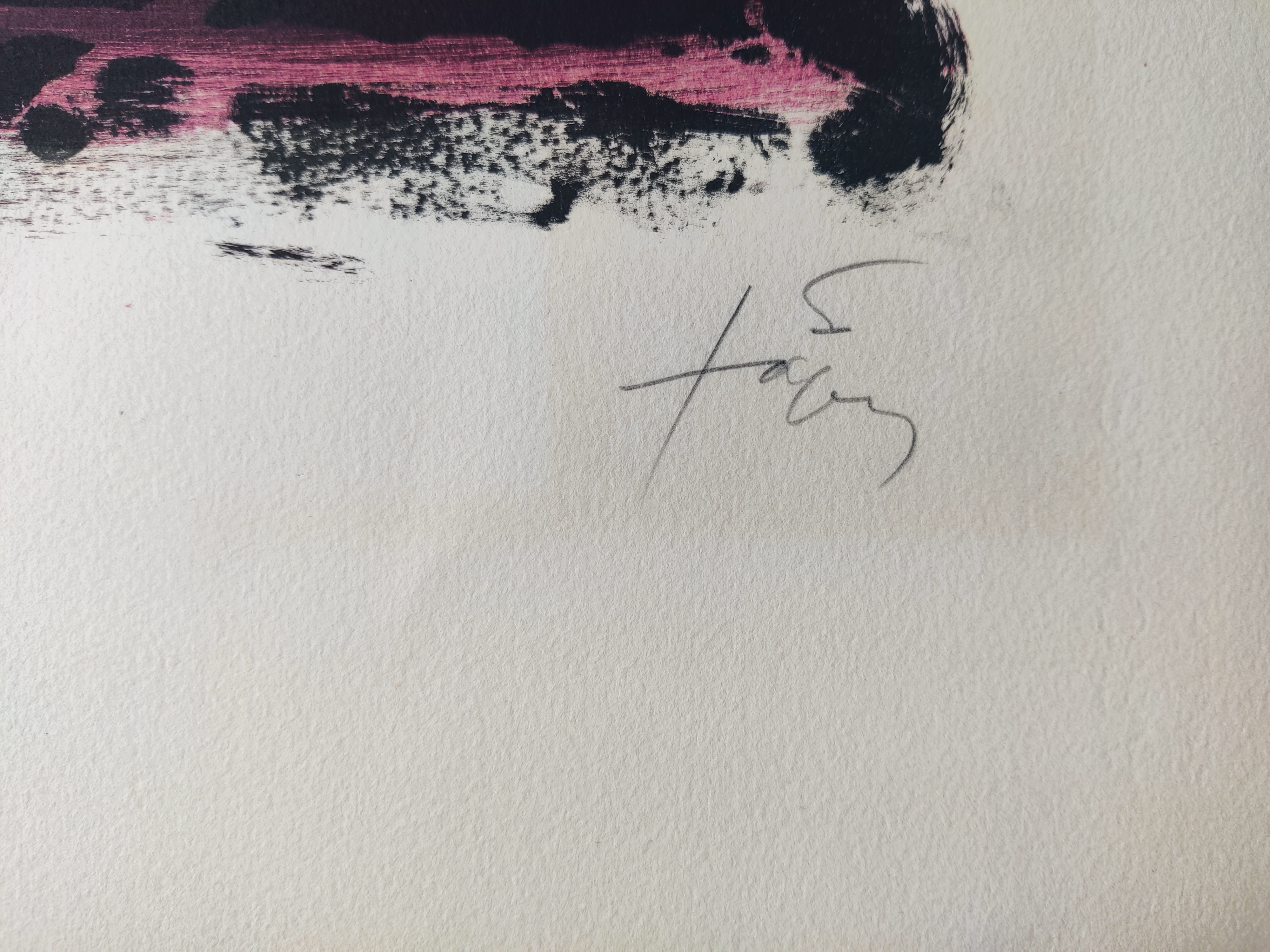 A painting on a blue wall with a red arrow on it.