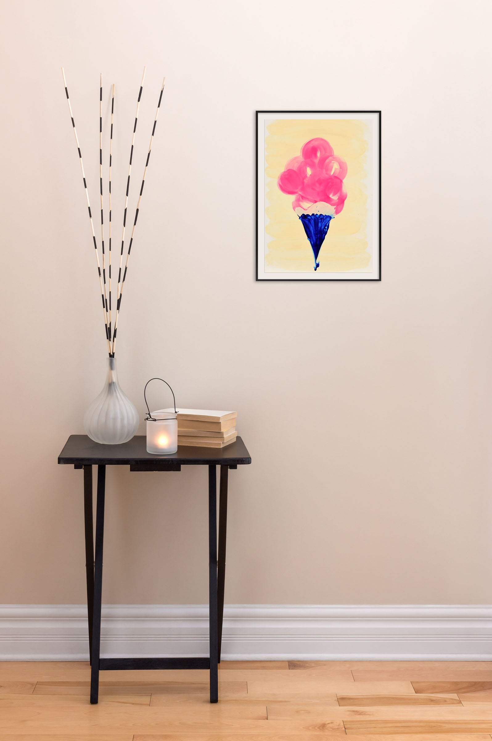 A painting of a pink and blue ice cream cone.