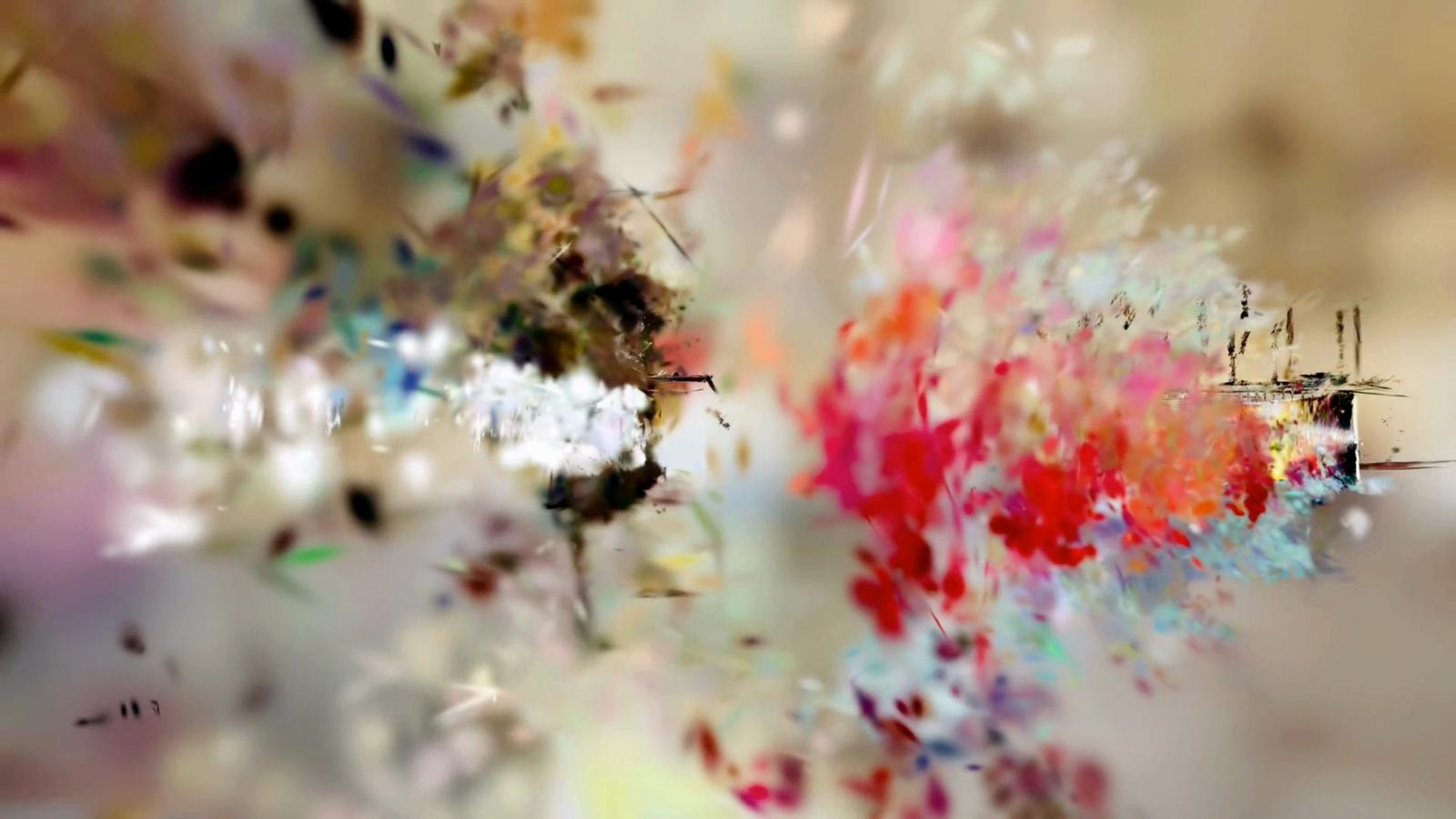 A vibrant abstract composition featuring a cluster of red and pink paint splatters against a soft, neutral background.