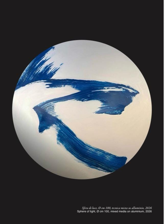 A minimalist artwork featuring a white sphere with bold blue brushstrokes against a dark background.