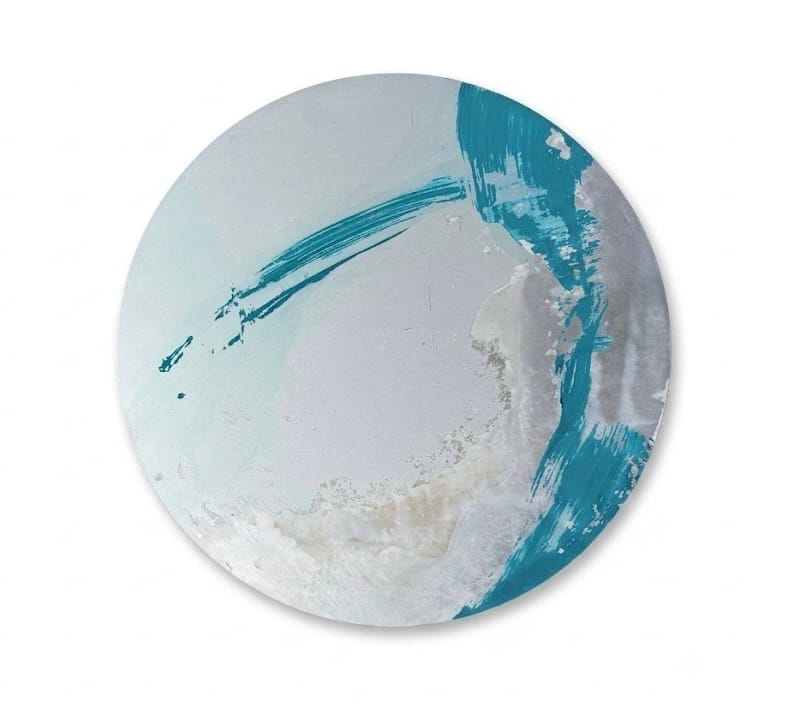 A minimalist abstract circular artwork featuring bold teal brushstrokes against a pale, textured background.