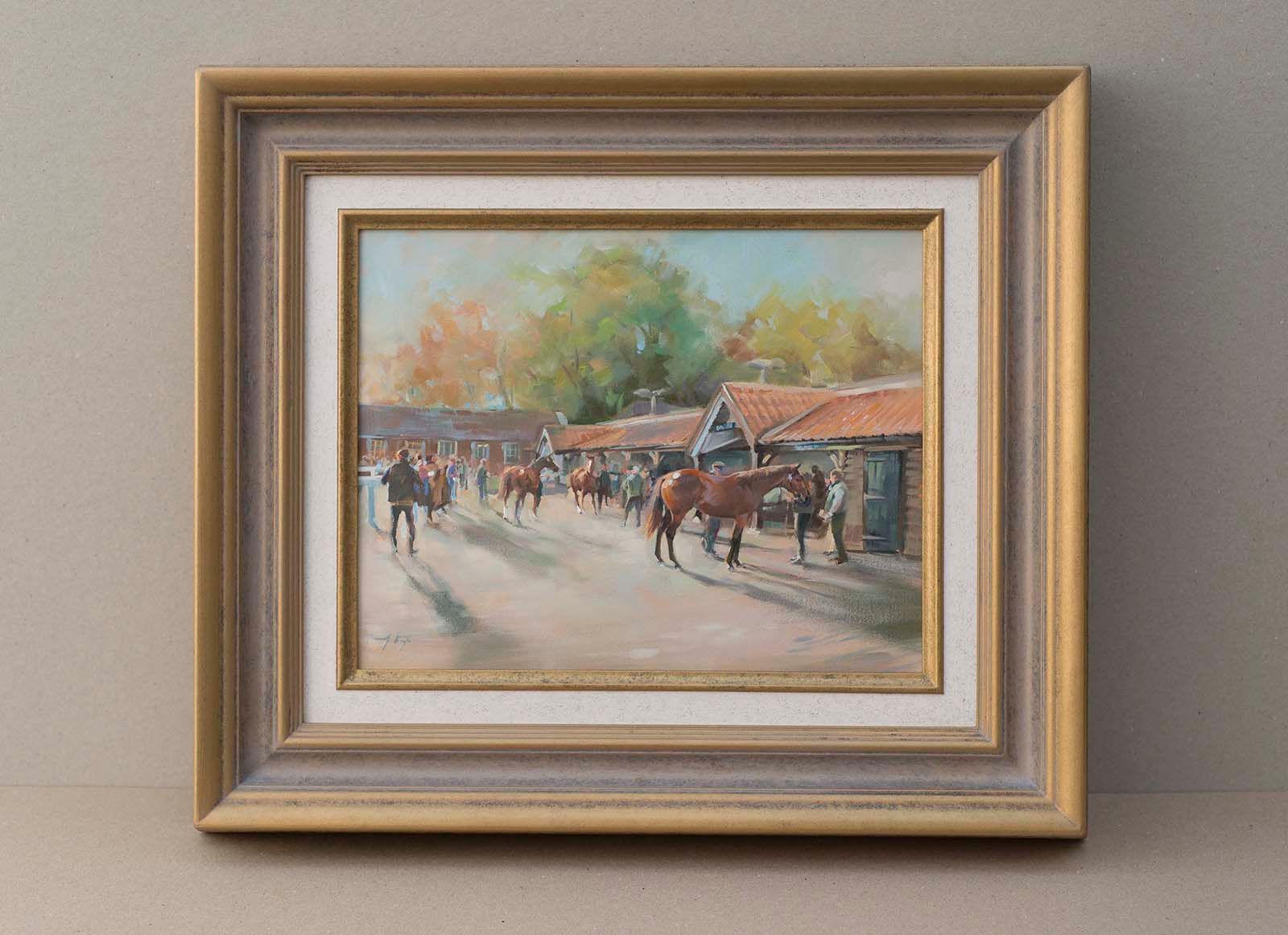 A framed oil painting of a sunlit horse stable scene with figures and horses.