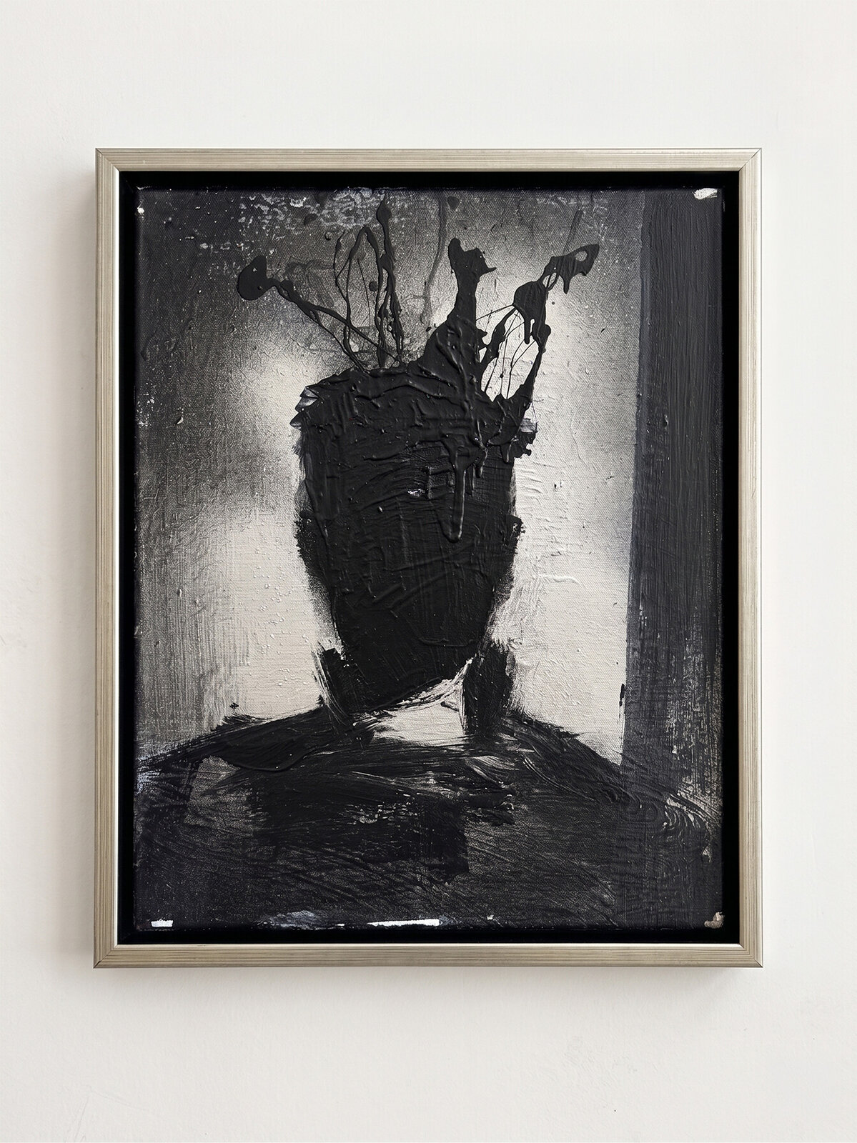 A monochromatic portrait of a figure with an expressive, dripping black head against a textured background.