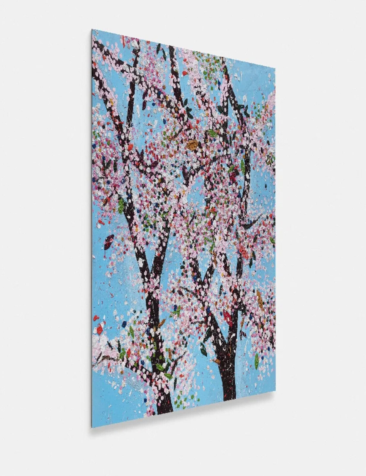 A vibrant, textured painting of a blossoming tree against a bright blue sky.