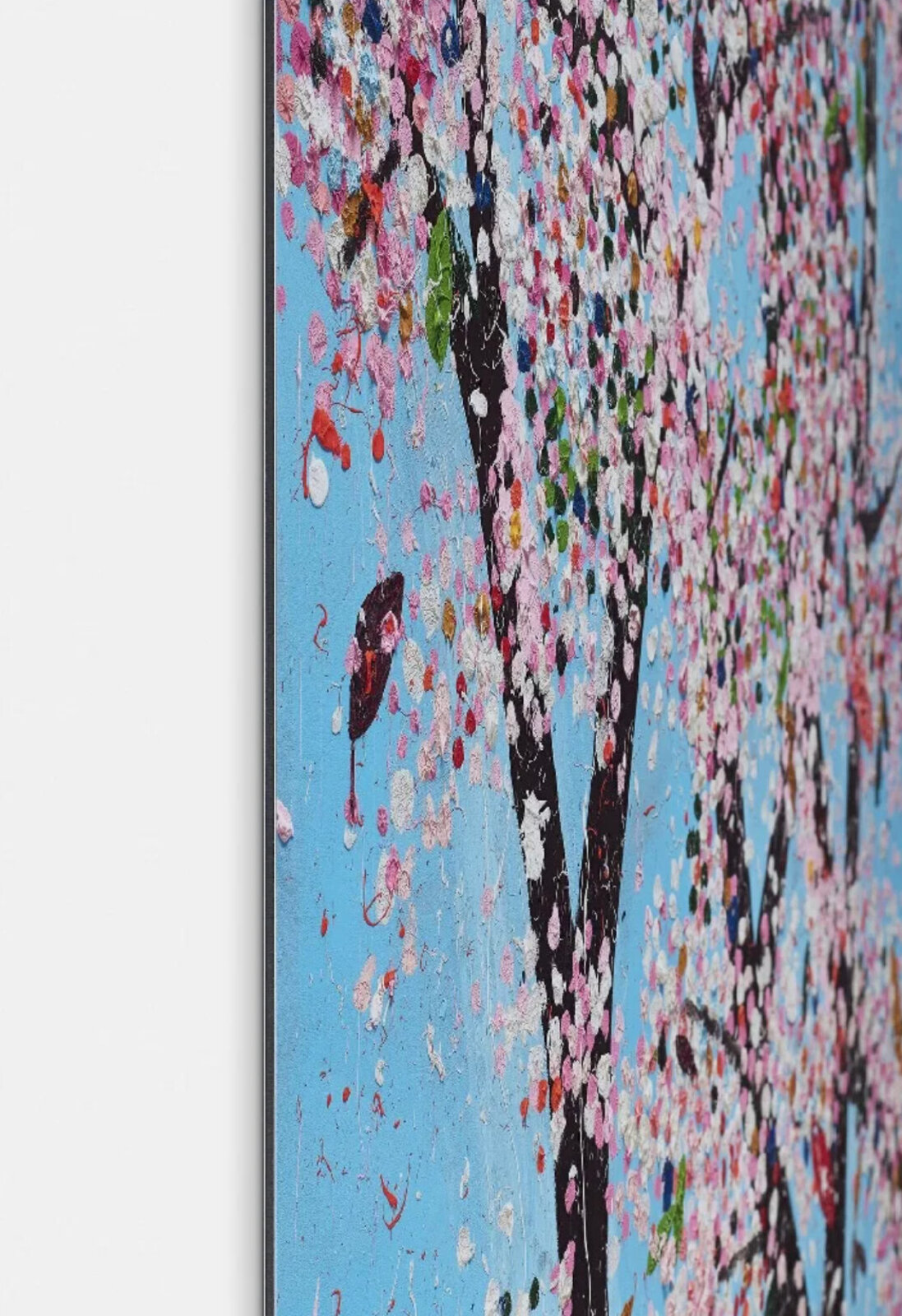 A vibrant, textured painting of a blossoming tree against a bright blue sky.