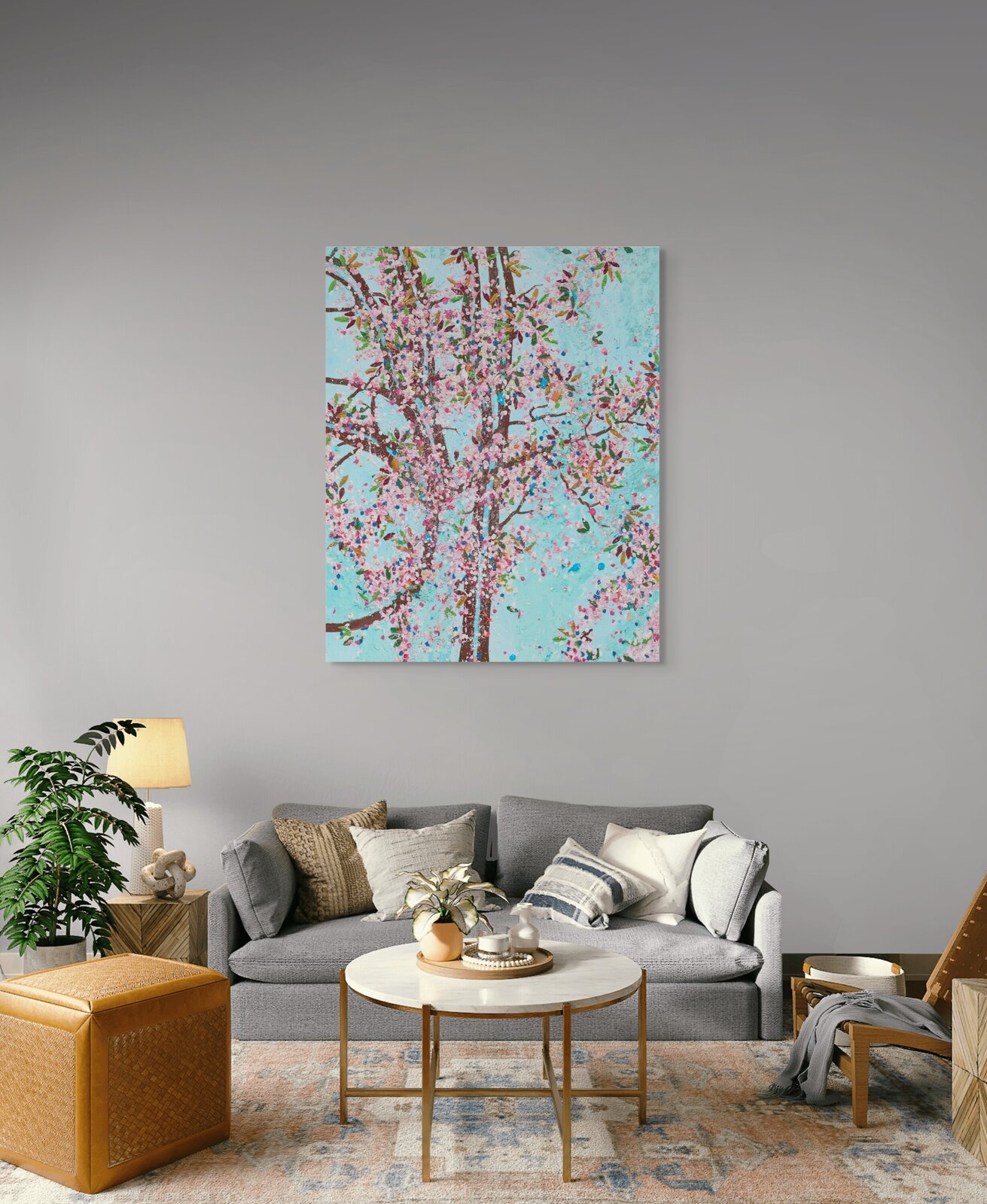 A textured painting of a blossoming tree against a bright blue background.