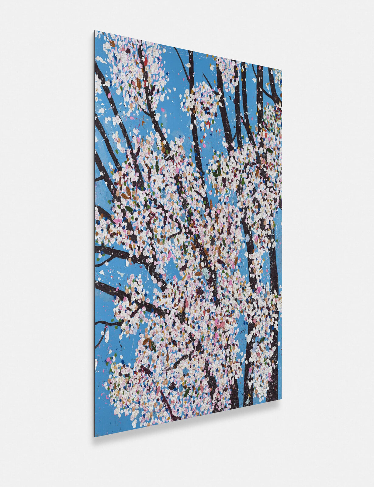 A vibrant painting of blossoming trees against a bright blue sky.