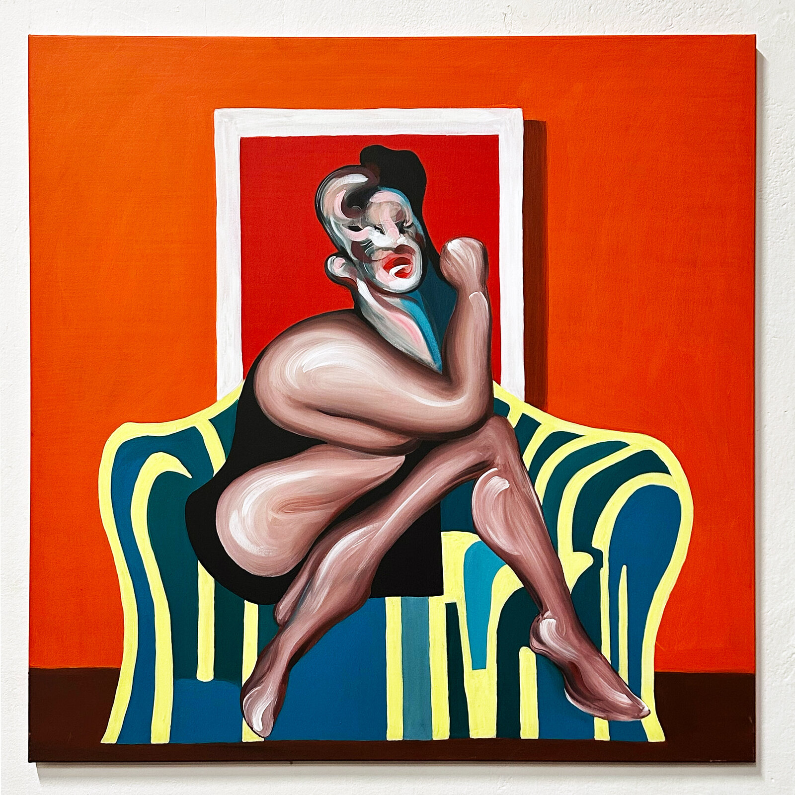 A modern living room scene featuring a bold pop-art painting on the wall above a sectional sofa.