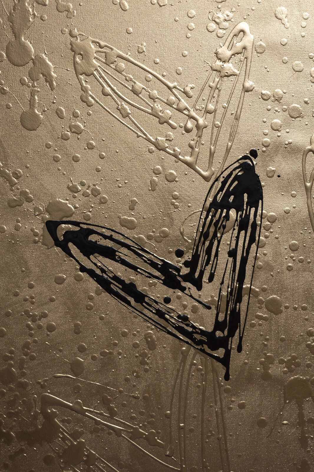 A monochromatic abstract composition featuring a central black heart shape surrounded by white, dripping lines and splatters on a textured surface.