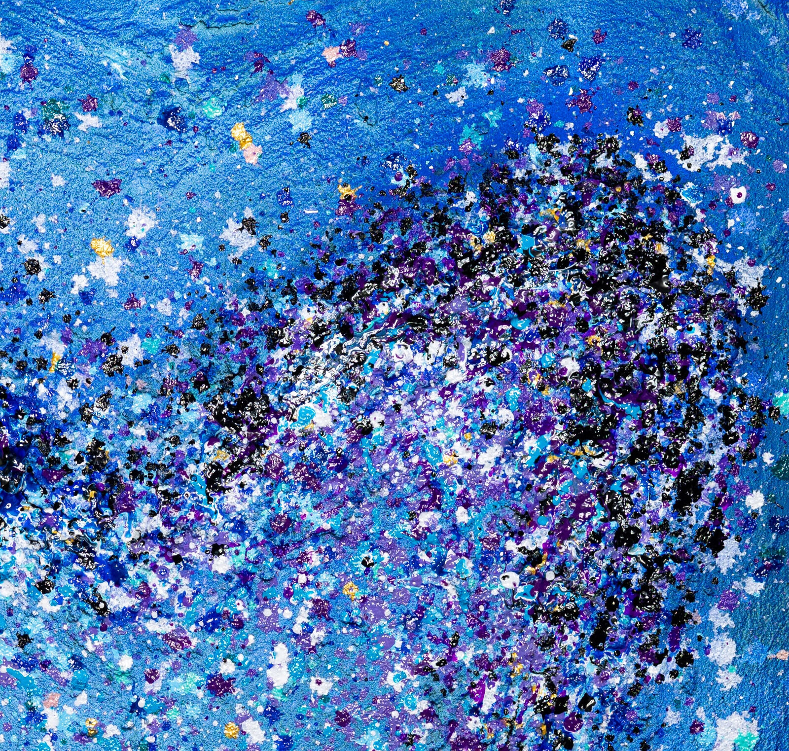 A textured abstract composition featuring a heart shape formed by splattered paint.