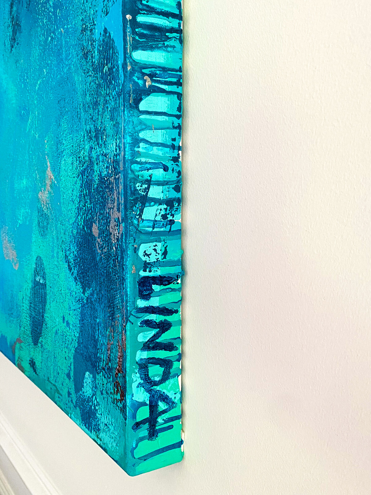 A textured blue and teal artwork featuring white text that reads 'underwater floating hold your breath' over a watercolor-style background.