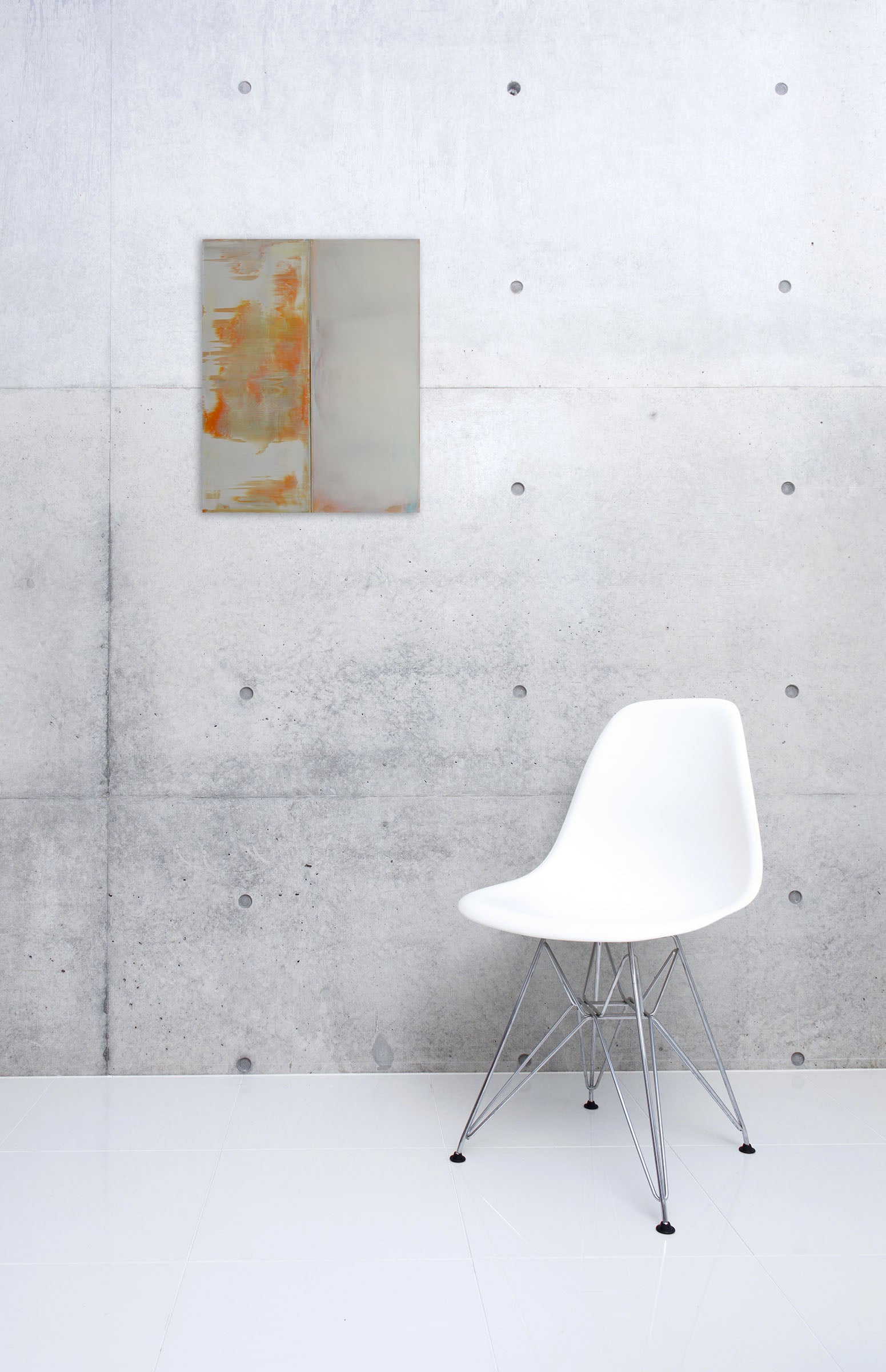 A painting with orange and white paint on a white background.