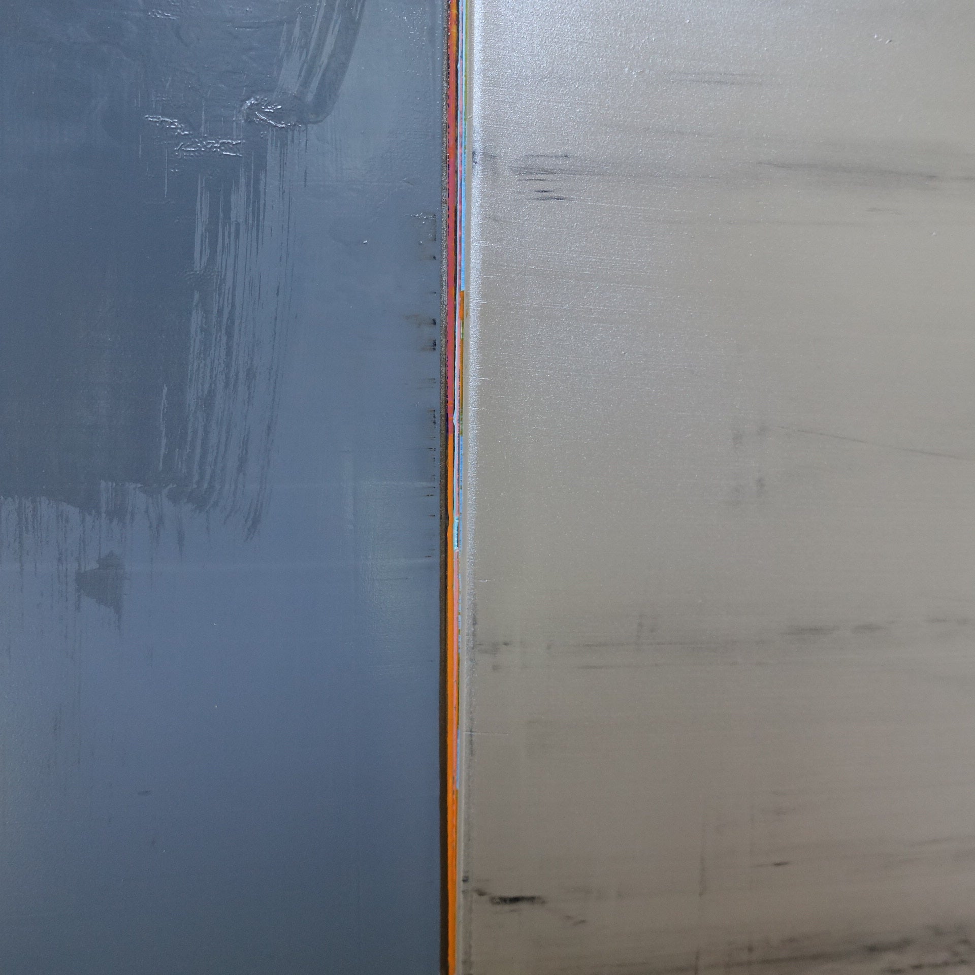 A painting with a blue and gray color block on a white background.
