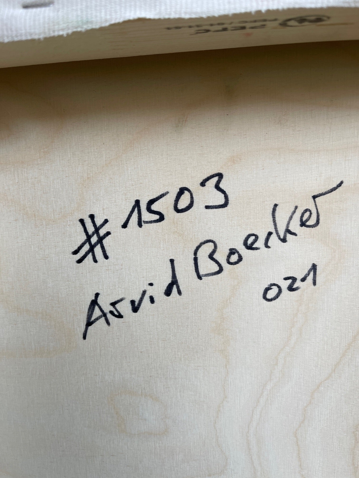 A painting of a green and black landscape on a white background.