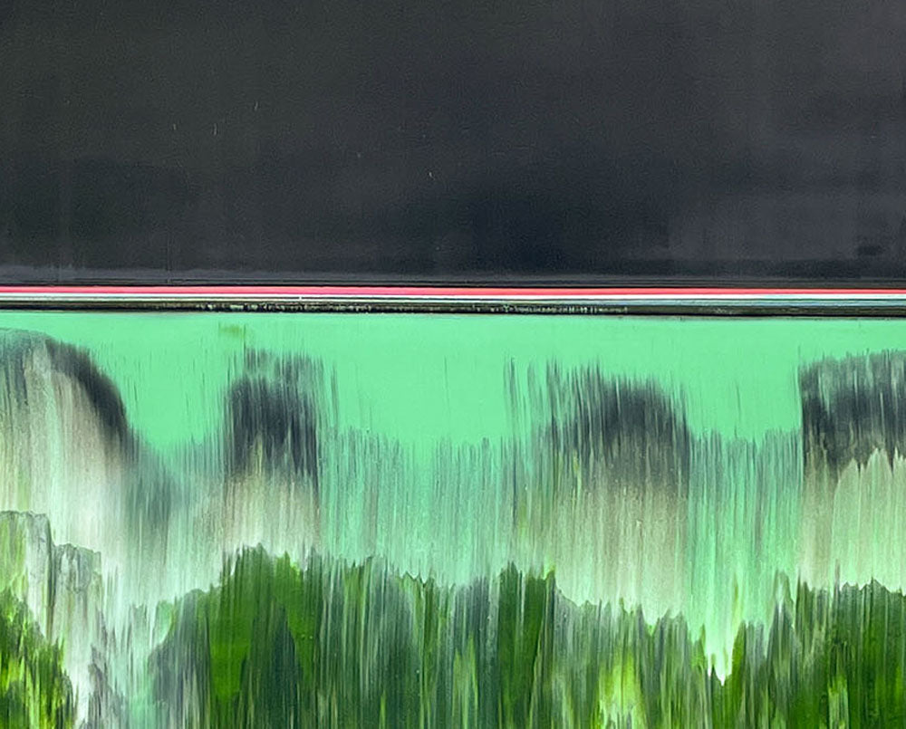 A painting of a green and black landscape on a white background.