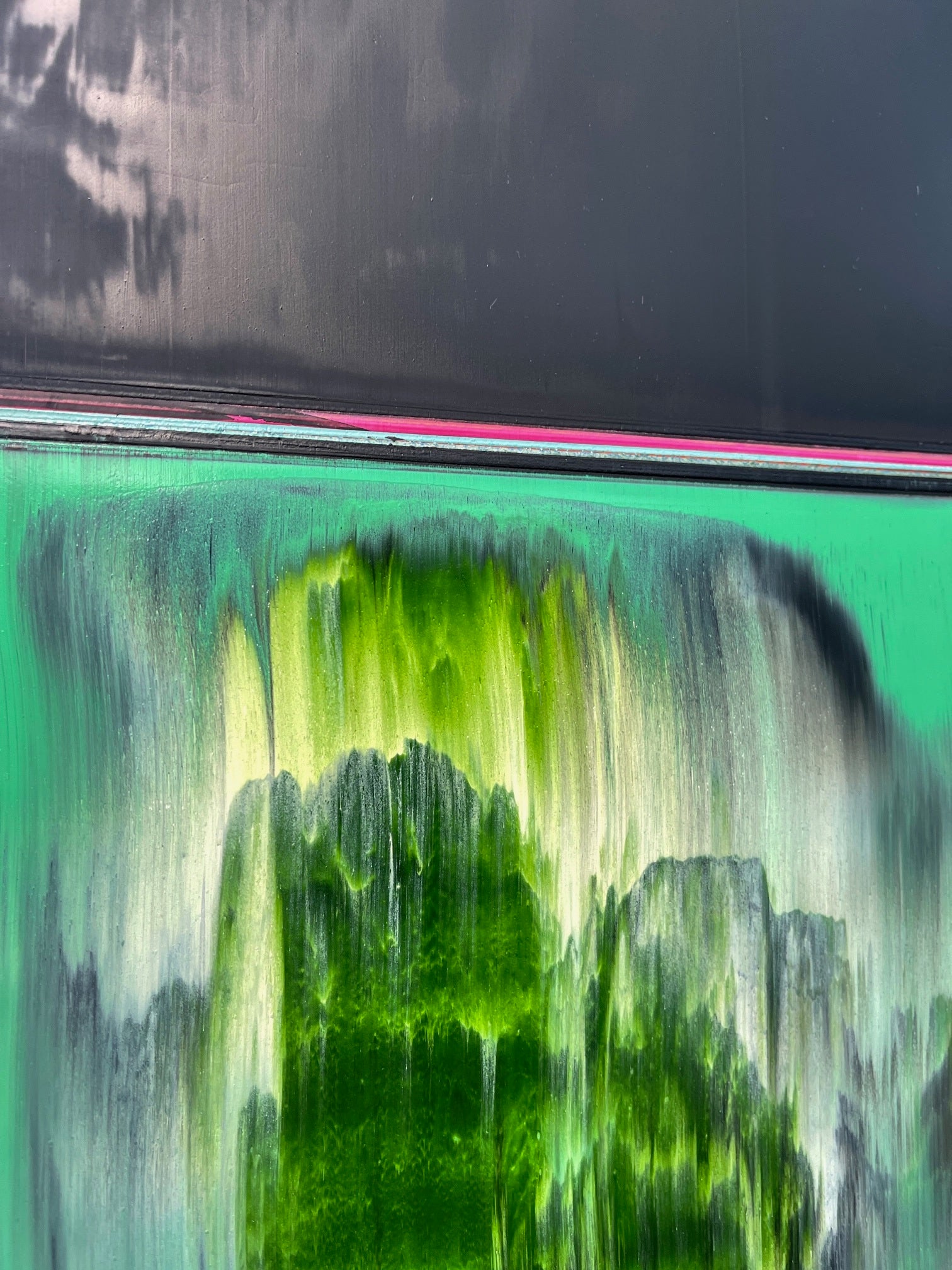 A painting of a green and black landscape on a white background.