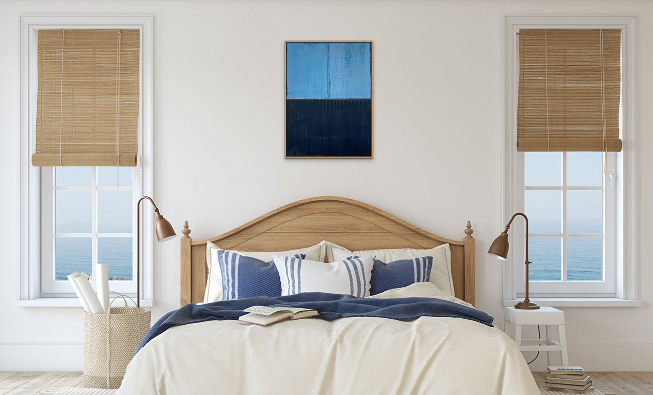 A painting of a blue and black painting on a white wall.