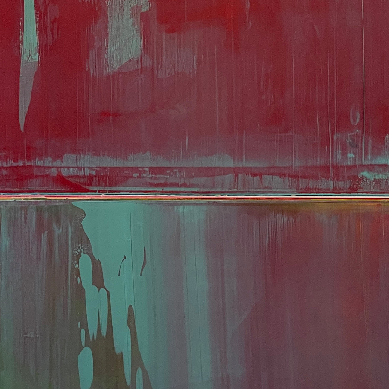 A painting with red and green paint on it. 