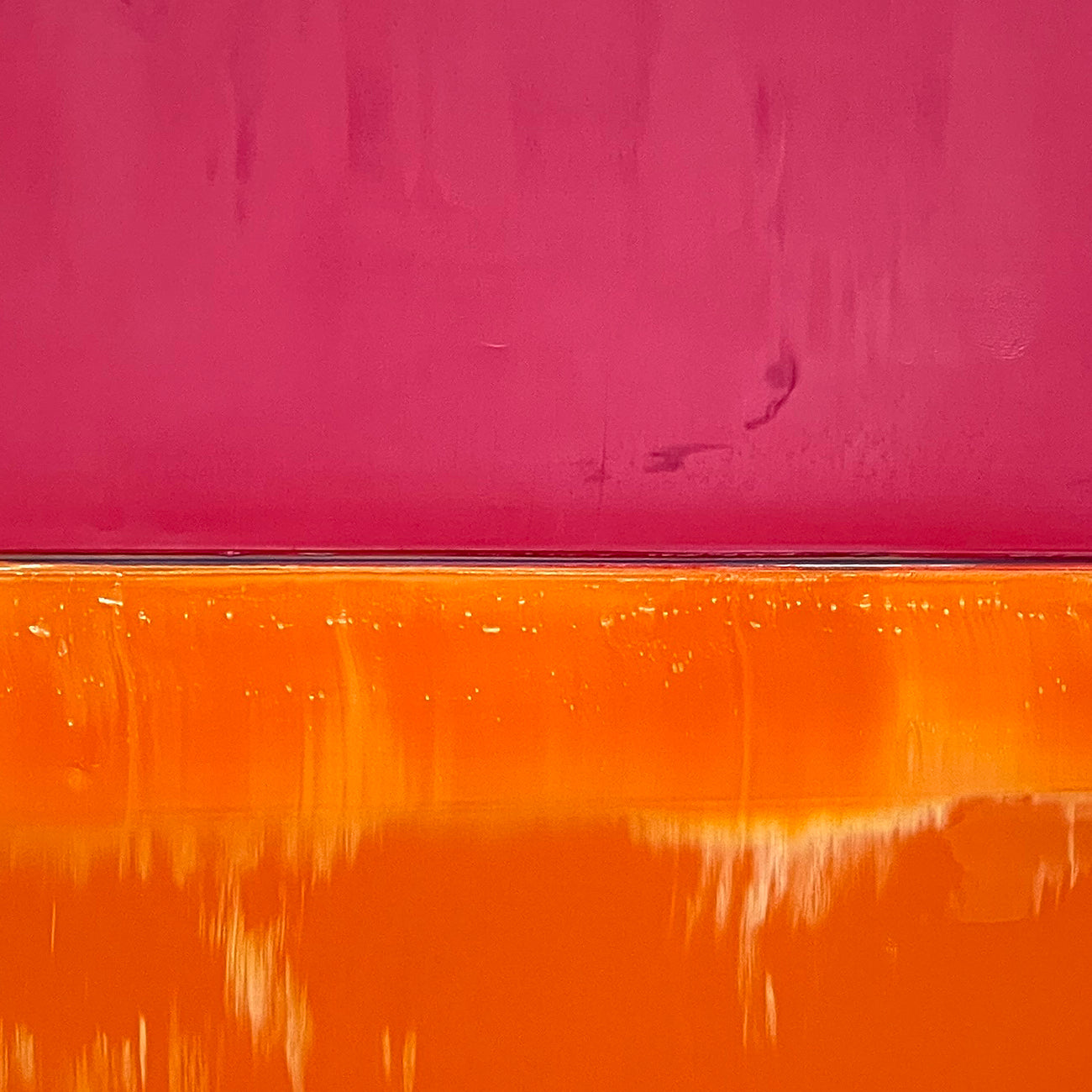 A painting of a pink and orange painting on a white background.