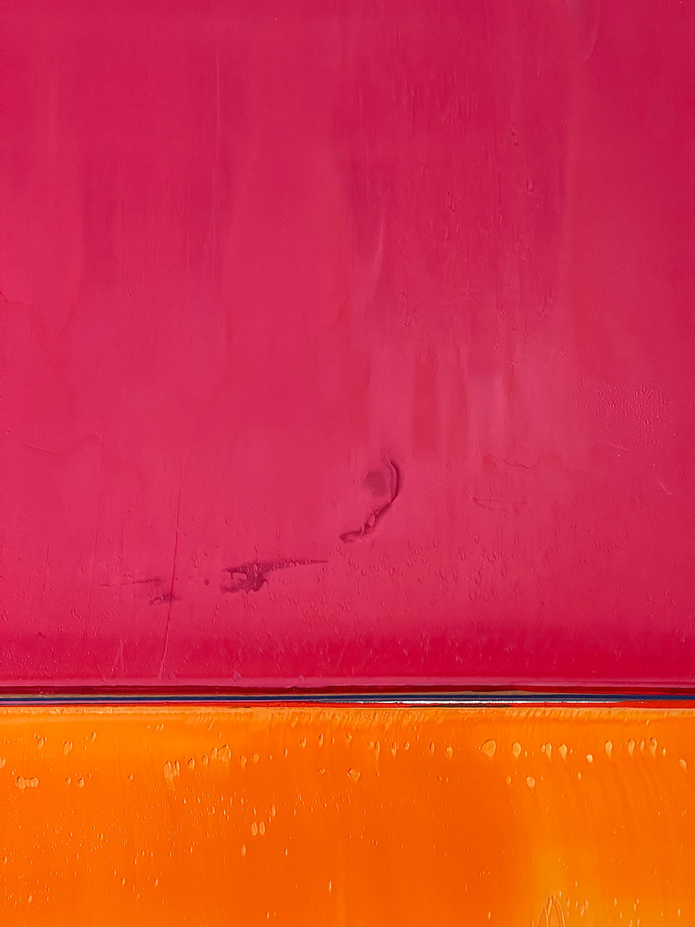 A painting of a pink and orange painting on a white background.
